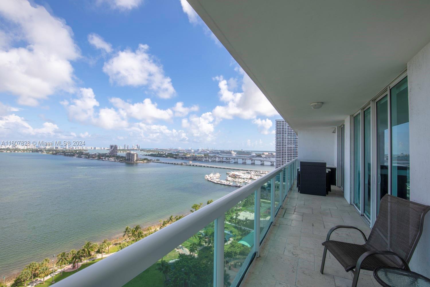 Breathtaking Miami Bay Views! Experience luxury living on the 22nd floor of this coveted Edgewater condo. Enjoy unobstructed, stunning sunrises and dolphin-watching from your expansive balcony. This pristine unit features bright, open spaces with floor-to-ceiling hurricane-proof windows, ceramic floors, exquisite finishes, luxury closets, and remote-controlled blackout shades in the spacious living area. Located in a prestigious building with high-end amenities, right across from a vibrant park. Move-in ready! Lockbox available for easy showings - book using ShowingTime.