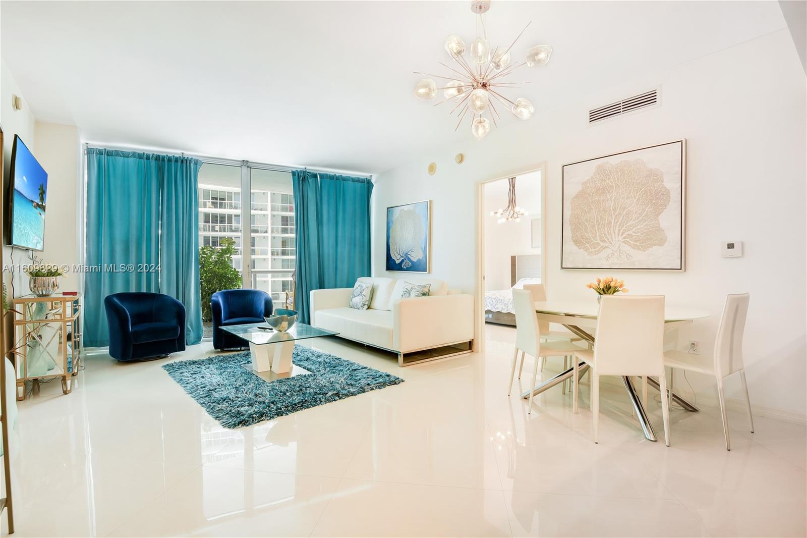 Large fully-furnished luxury condo featuring a hard-to-find split floor plan with overlooking Biscayne Bay and rooftop pool at Icon Brickell, with 2 Bedrooms, 2 Bathrooms + Den, and an oversized balcony stretching the entire wide of the apartment.  Marble floors, high-end appliances, and over 1,100 sq. ft. of living space in this pristine apartment. Amenities include the 300,000 gallon rooftop pool overlooking Biscayne Bay, a 5-star spa, waterfront gym, and multiple on-site restaurants and cafes, including Cipriani!  Enjoy a location that is just steps to all the best dining, shopping, and nightlife in Brickell, and just a short ride to the beach!
