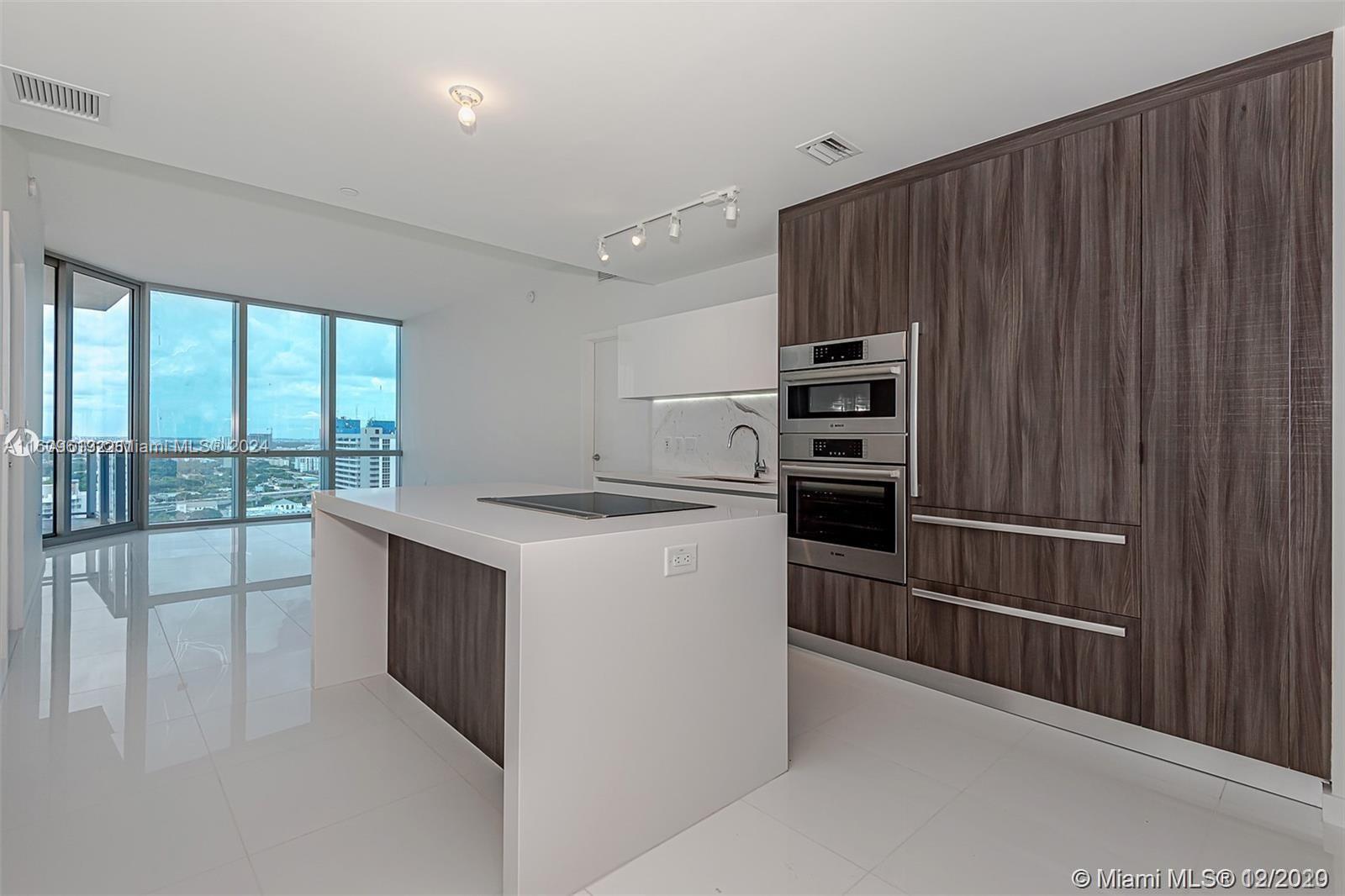 Luxury 2 Bed + Den / 3 Full Bath Condo at the Miami World Center! Including European modern kitchen with top of the line appliances, 10 foot floor to ceiling windows, and a HUGE balcony. This building has the best amenities in the area: Basketball Court, Boxing Ring, Gym, 24 Marketplace, Recording Studio, Movie Theater, Relaxation Lounge, Spa/Salon, & more. It is conveniently located next to I-95 and I-395 Text/ Call Kevin to see it.