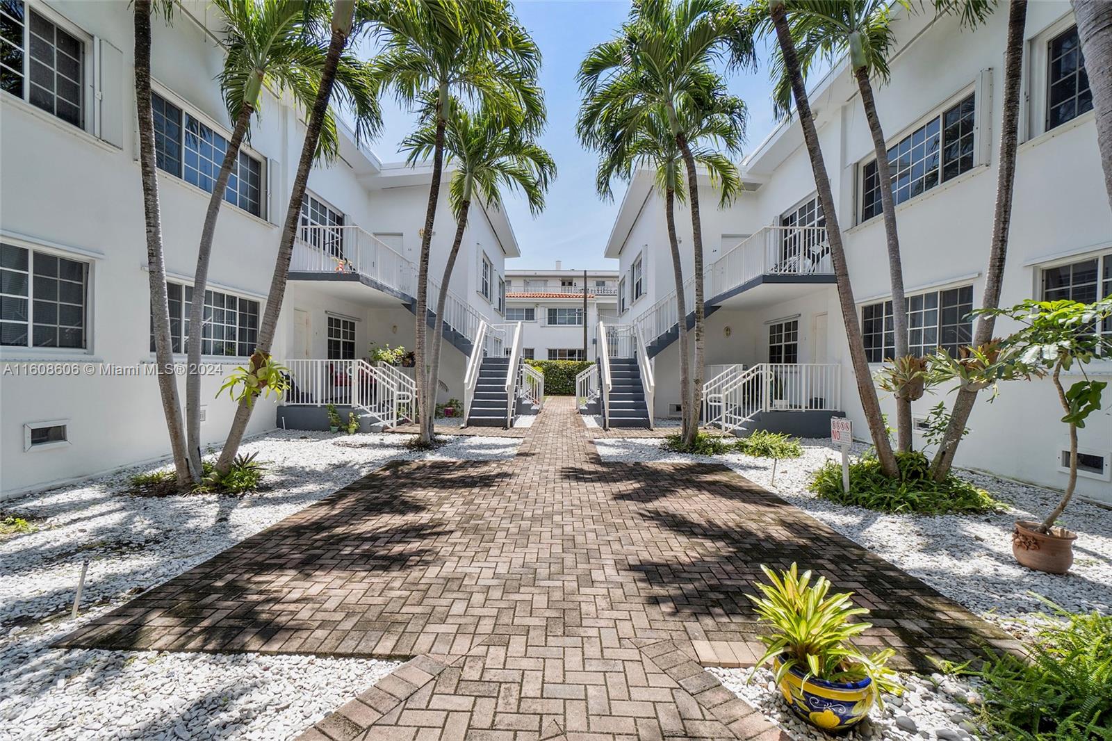 Rarely available 3 bedroom 2 bathroom condo in beautiful Bay Harbor Islands! This one of a kind unit offers 1314sqft of interior living space & is easily accessible on the ground floor-no climbing stairs! This corner unit floods with ample natural light. Amazing location 10 minute walk to the beach & Bal Harbor Shops, 5 minute walk to Ruth-K Broad (10/10 school), directly behind police station. 1 minute walk to dog park & playground, 2 minute walk to Pura Vida, other shops & an easy walk to many houses of worship.
Enjoy the sun on your large private patio. Abundant closet space (6 oversized closets). Oversized master bedroom. Full sized LG front loader washer & dryer in unit. Ceiling fans. Hardwood floors. Central AC. 1 designated car space & 1 community space. Cable TV & WiFi included.