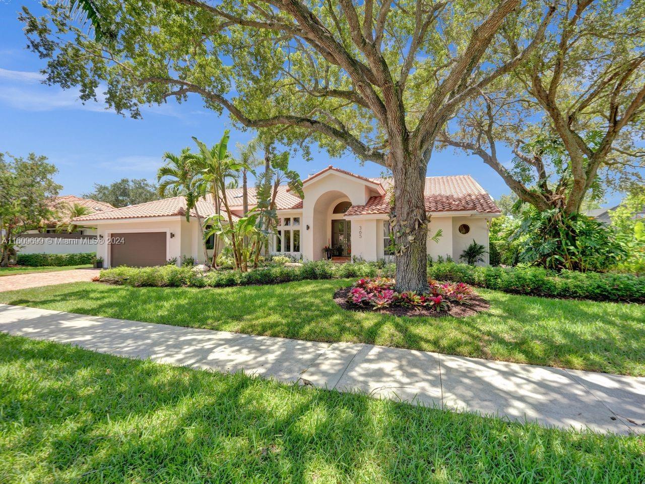 This is your Dream Home! Located in exclusive Palm Island, one of Weston's most desirable communities, this pristine home has timeless charm & a beautiful open floor plan w/5 Bedrooms & 3 1/2 baths. Features include brand new impact windows & doors, handcrafted built-ins, family room & living room w/double-sided fireplace, oversized chef's kitchen w/Sub-Zero appliances, Thermador gas stove, built-in Miele coffee/espresso system, new bathrooms w/European fixtures, endless gas hot water, primary bedroom w/sitting area & luxurious bath. The spacious outdoor covered living area has an oversized pool, large backyard, lush landscaping & piped gas grill. Gated community w/front/rear gates & neighborhood park, walking distance to ball fields, schools, places of worship, shopping & dining!