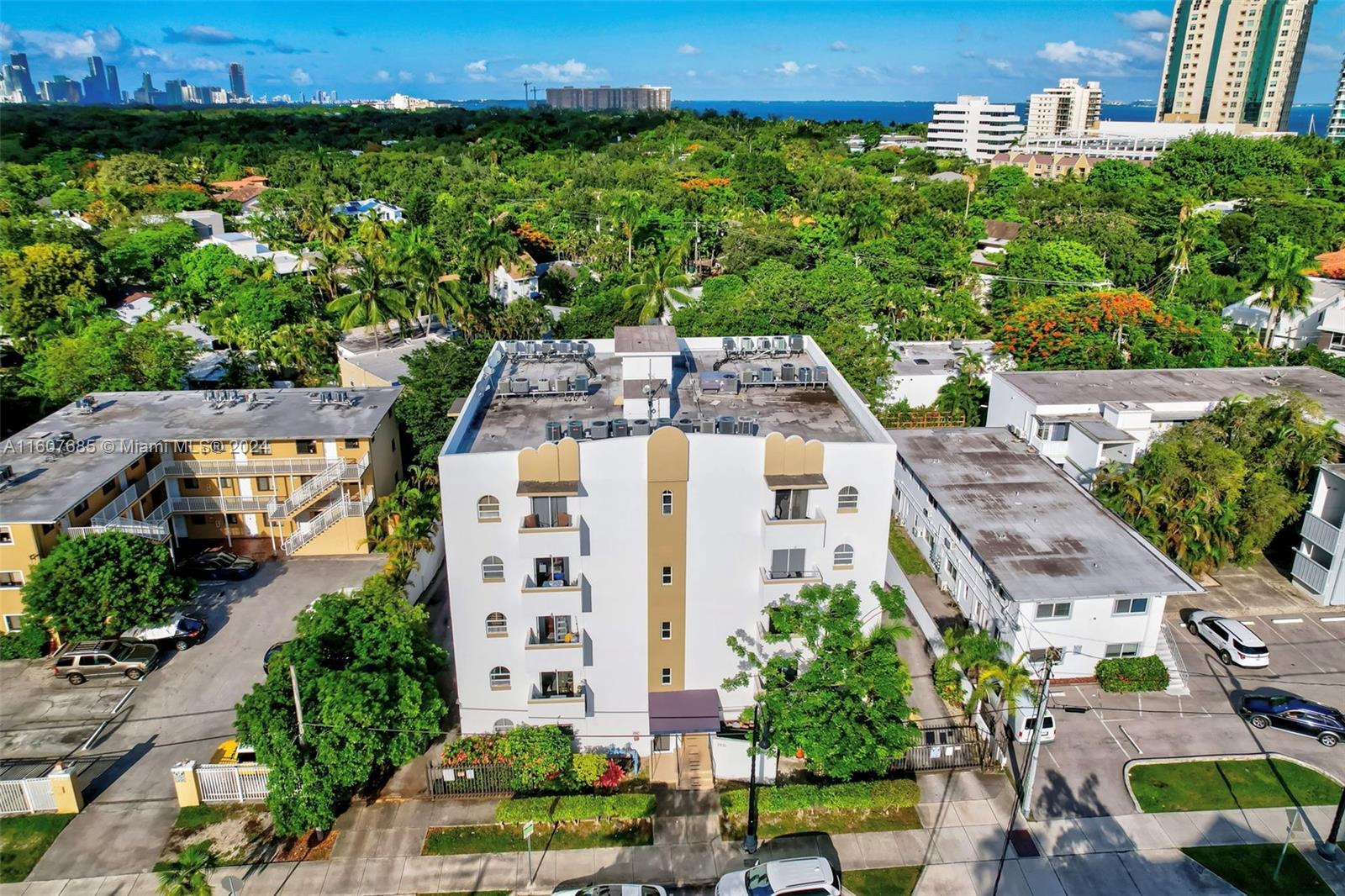 Excellent Location with one of the lowest HOA Fees in Coconut Grove! Currently rented at $1900/month. Whether for personal enjoyment or investment, this charming 1-bedroom, 1-bathroom condo offers a perfect combination of comfort and convenience. Situated in a lively neighborhood, the unit boasts an open kitchen, a cozy living area, a bright bedroom with ample natural light, and tile flooring throughout. Enjoy the added benefits of a private balcony with great views, in-unit washer/dryer, and a designated parking space. Guests have access to gated parking spots and ample street parking nearby. Ideally positioned just a short walk from Coco Walk, where you can explore a variety of dining, shopping, and entertainment options. Don’t miss out on owning a piece of Miami’s vibrant lifestyle!