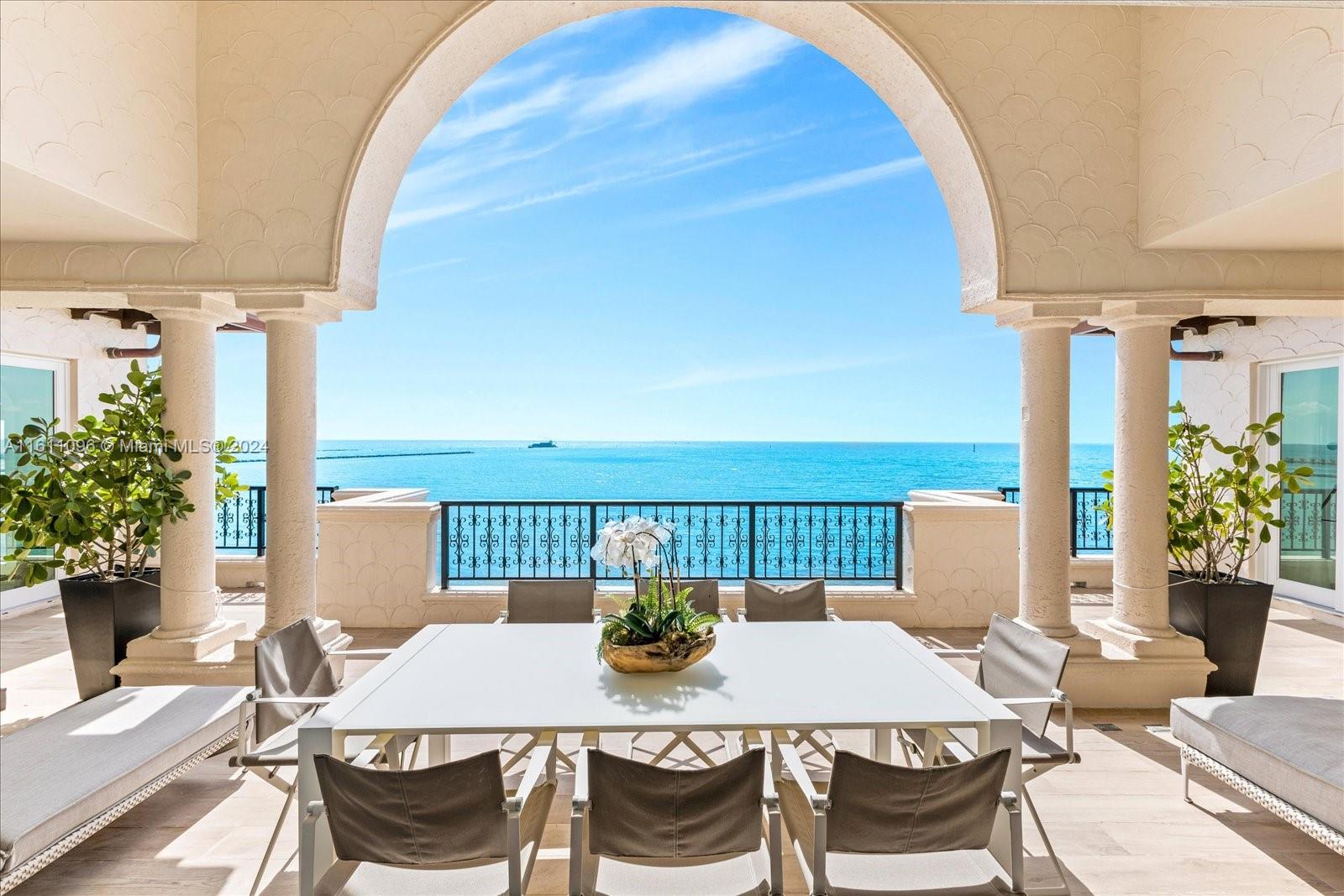 This one of a kind newly renovated gem greets you with 20 foot ceilings, a skylight and ocean direct views of the Atlantic ocean, government cut and Miami downtown. This magnificent Penthouse showcases: a private elevator, east & west views with expansive terraces, 5 bedrooms + 1 staff bedroom, 7.5 bathrooms, marble floors throughout, 10 ft gas fireplace, formal dining room, a state of the art kitchen with top of the line appliances, butler's pantry, impact glass doors and many more features. The PH includes: 8 parking spaces, 1 golf cart, 3 assigned golf cart parking spaces and 1 storage. Experience Fisher Island living in this exceptional masterpiece! Easy to show.