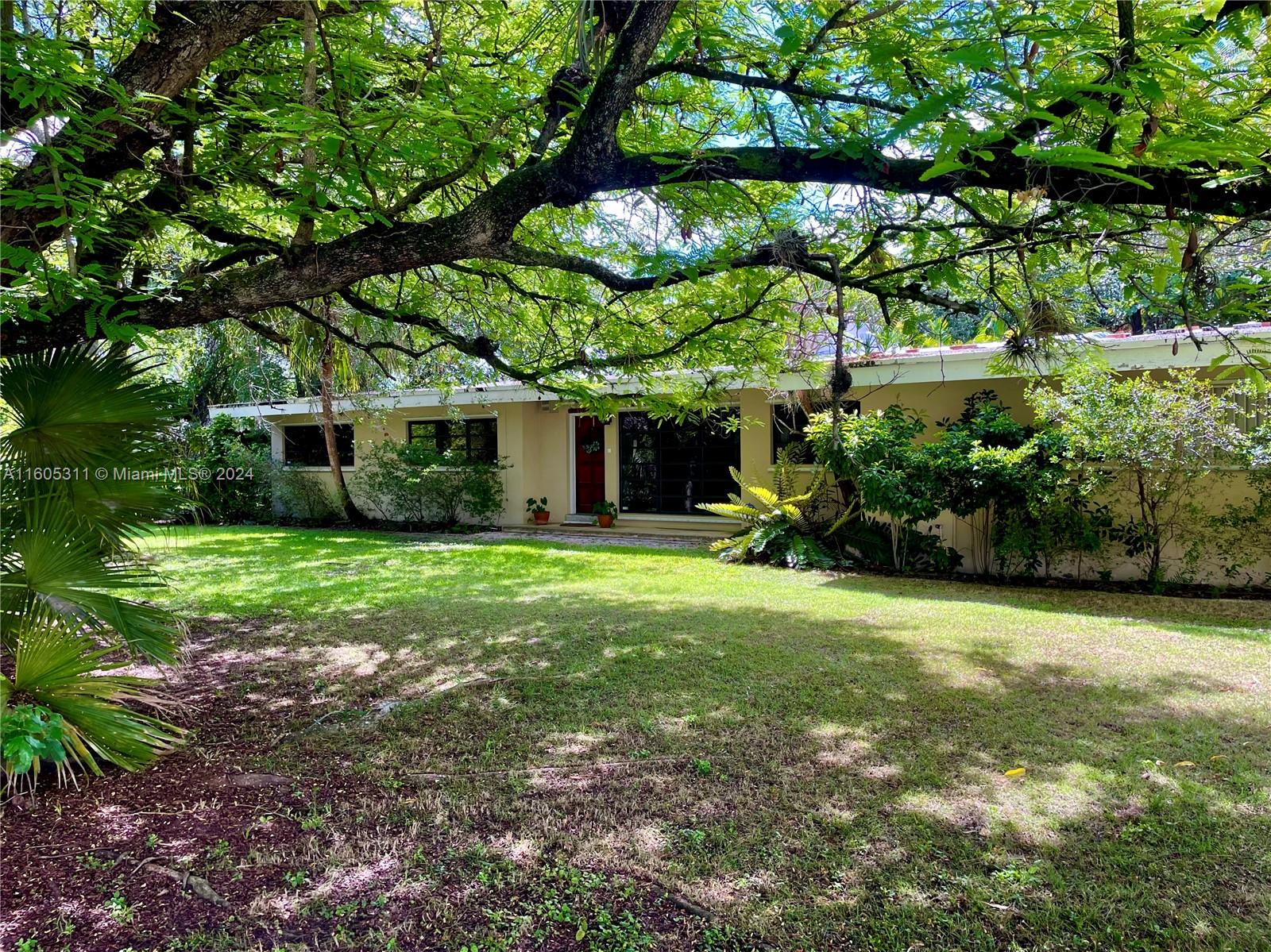 Truly a rare gem on the edge of South Miami! This lush, one-acre estate was originally owned, built and planted by renowned University of Miami Botanist, Dr. Floyd Shuttleworth. Boasting a vast collection of mature Miami-Dade Pines, Live Oaks, Orchids and Tropicals including Mango, Avocado, Lychee, Tamarind, Jamaican Dogwood & Frangipanis among many others. Bring your Architect to rebuild the existing home (offered as-is, needs updates/repairs) or design a new custom dream home surrounded by your own private Fairchild Garden in this delightful, quiet neighborhood of gated acre estates & modern architectural dwellings. One-of-a-kind opportunity to own a slice of Miami's tropical paradise under the canopy of time, where soaring native Pinelands of this size and stature are very rare indeed!