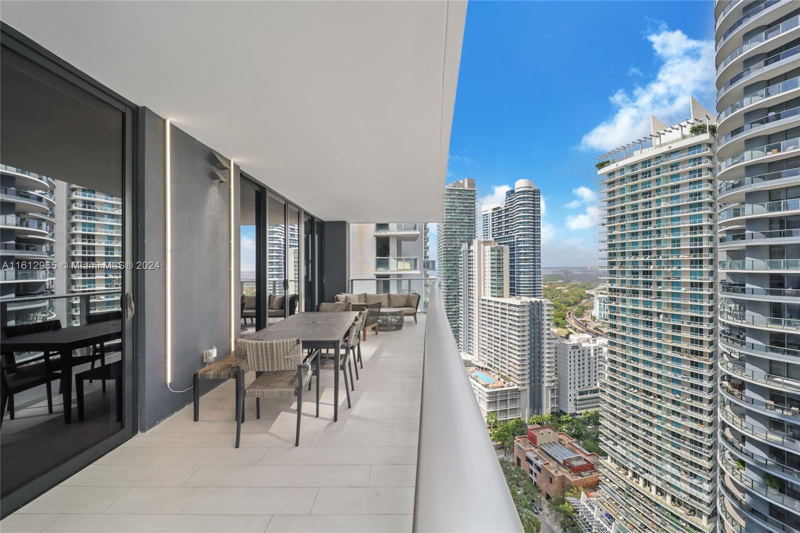 Welcome to this beautiful TURNKEY, FULLY FURNISHED renovated corner unit on the 06 lines of 1010 Brickell Ave. It offers luxury at every turn: a 3-bedroom (converted from 2 + Den), 3-bath gem with walk-in closets, and a top-of-the-line kitchen with appliances, it boasts an expansive balcony showcasing breathtaking Miami views. Residents enjoy exclusive amenities, an upscale restaurant, and a stunning swimming pool on the 50th floor—the spa beckons with a jacuzzi, massage rooms, sauna, and steam room. Stay active with basketball, and racquetball courts, while kids explore the indoor playground and arcade. Located steps from Brickell City Centre and the Metro-mover, this is MIAMI living at its finest.