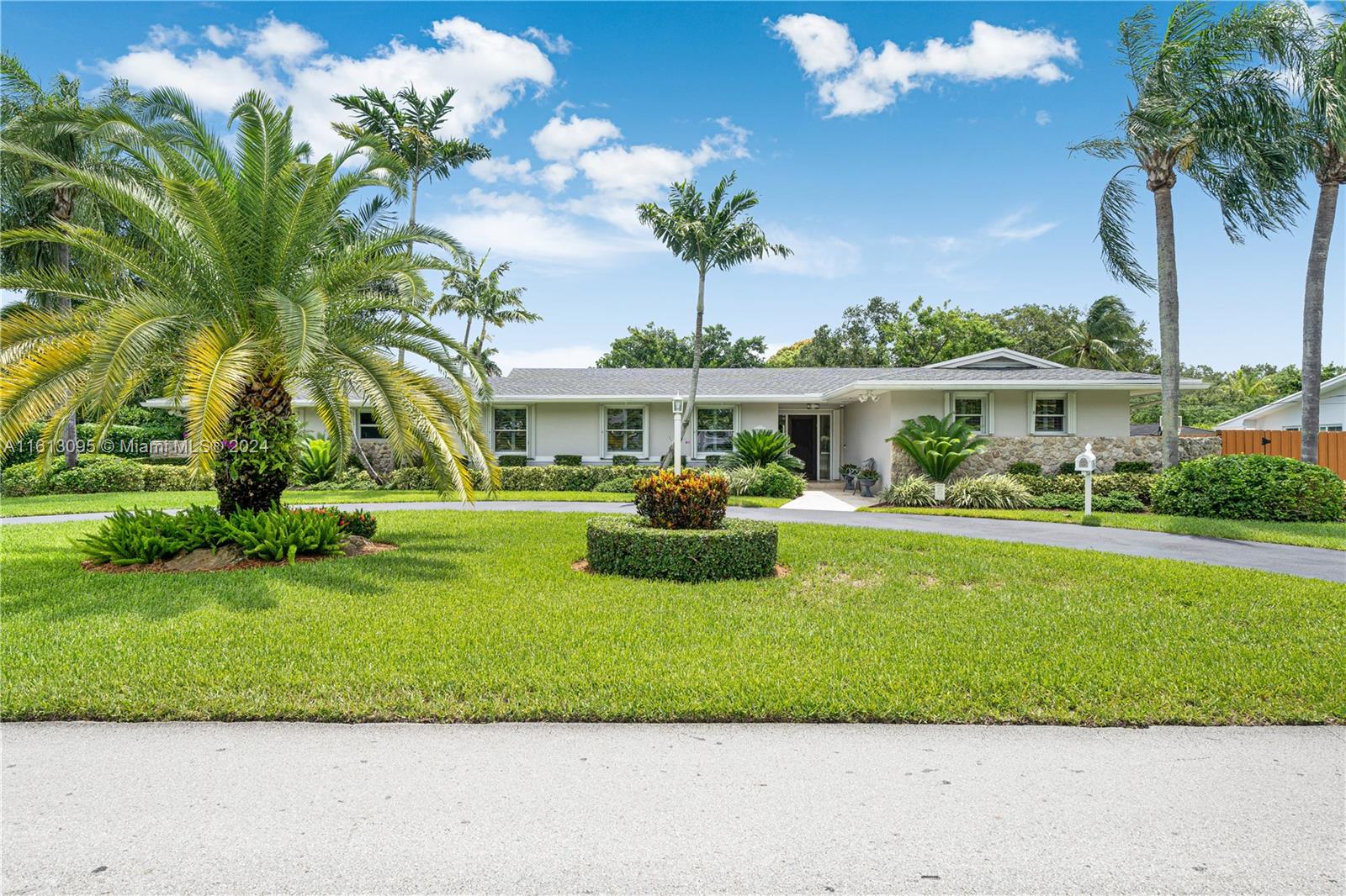 Palmetto Bay Pristine steps away from Coral Reef Park on an oversized lot! Meticulously maintained, loved, & thoughtfully updated this light-filled 4 bd/2.5 bath residence oozes tranquility, & boasts renovations such as impact windows/doors,new bathrooms,  updated pool/patio,& new roof. The light-filled floorplan offers 4 large bedrooms and 2.5 updated baths. Enter the foyer siding to a sizable living/dining room. The oversized eat-in kitchen opens to a spacious family room flowing to a fantastic covered pool/patio overlooking a beautifully manicured oversized backyard perfect for a South Florida indoor/outdoor living experience. Hop on bordering paths steps away from 50-acre Coral Reef Park, and top-rated private/public schools. Who is ready to call this fantastic tranquil oasis, home?