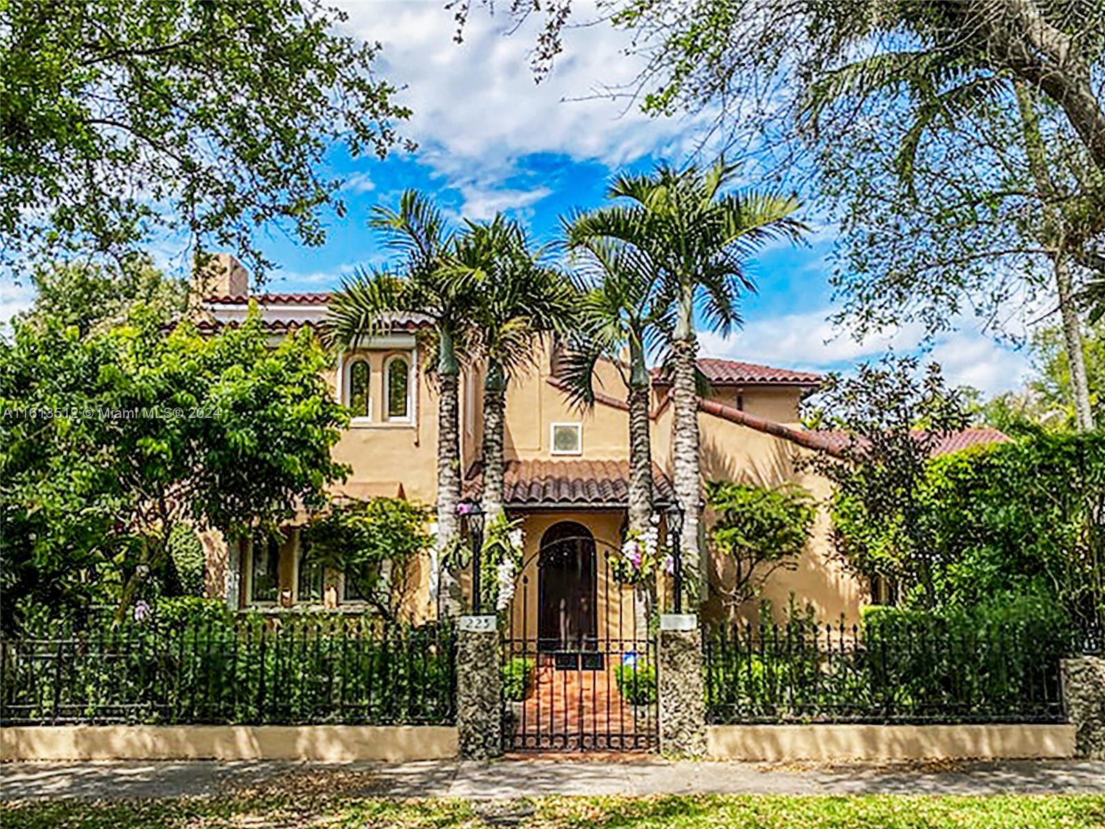 Unique,1924 Spanish Mediterranean mansion on a double lot surrounded by beautifully landscaped gardens with lush tropical vegetation, an absolute sanctuary in the best walkable location of Coral Gables.  This warm and welcoming home was built with the finest materials and craftsmanship, marble and wood floors throughout as well as arched doorways and windows, a chimney, plus a mahogany spiral staircase leading to a rooftop mirador. The chef’s kitchen has a gas stove and an extended area for entertaining. The primary bedroom suite boasts his and hers bathrooms as well as plenty of California Closets. The home has 4 bedrooms and 8 full bathrooms which could accommodate living quarters for guests or extended family. There are plenty of closets throughout including an enormous attic.