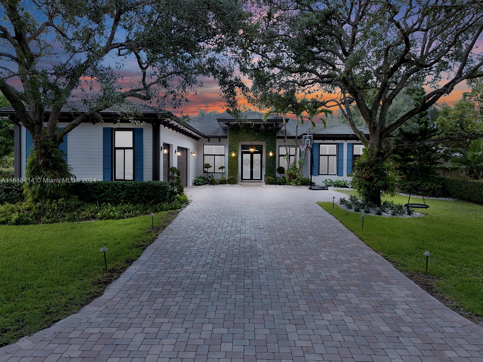 This stunning 5-bedroom, 4-bath home sits on a sprawling 20,000 square foot lot, offering luxury and comfort. The expansive outdoor area features a 900 square foot patio with a new covered outdoor kitchen, a sparkling pool with a spa, and state-of-the-art smart fans—perfect for entertaining and relaxing. Inside, the home boasts 12-foot ceilings, creating an open and airy feel throughout. The gourmet kitchen is a chef's dream, equipped with stainless steel appliances and designed for hosting gatherings. Additional features include a 3-car garage and a full house generator, ensuring convenience and peace of mind. This home is a must-see!