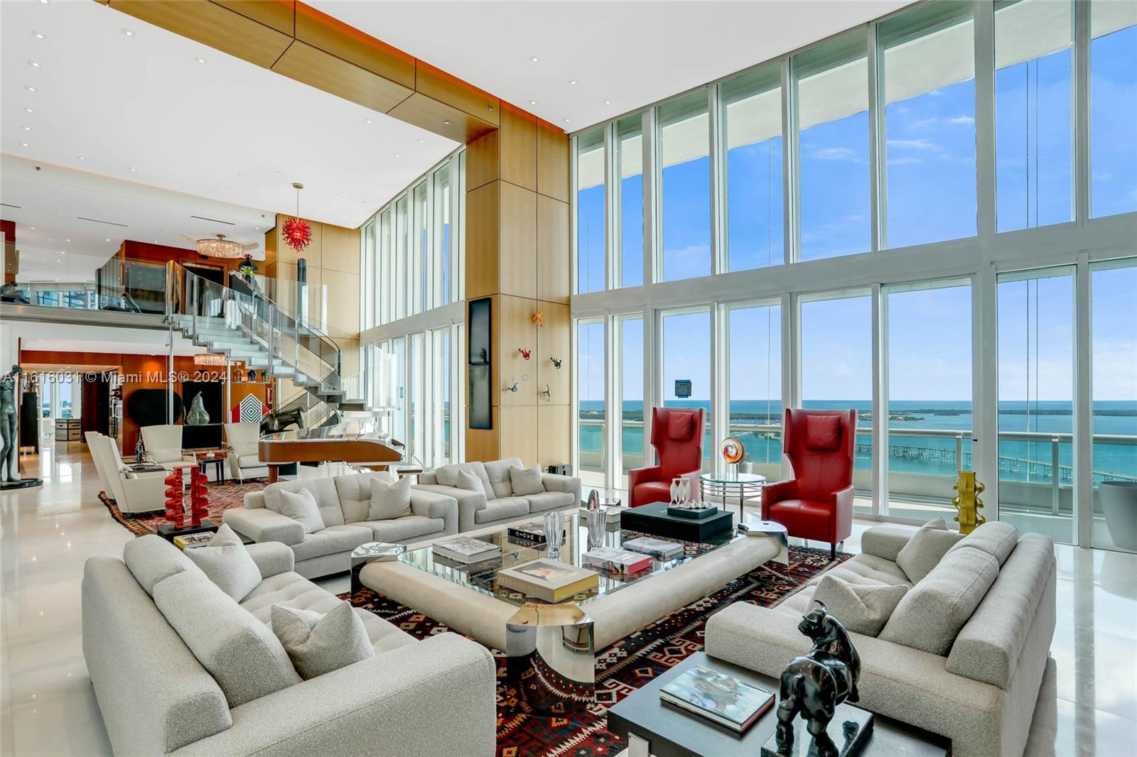 This is an absolutely gorgeous and stunning 10,000 sq. ft. duplex in the sky with 180 degree views of Biscayne Bay, Miami Beach, Fisher Island, Key Biscayne and beyond and city scape views from the west side. The terrace and pool comprise of 4394 sq. ft. alone!! Completely updated in the most exquisite taste and sophistication. All new marble floors. This is a home for the most cultured and elegant buyer. No expense was spared. Enjoy your own private pool , 4 assigned parking spaces (2063,2086,2087,2088) and storage #B-060. Marina slip #13 with dimensions 27' x 97' x 5'25'' fits up to a 90' yacht. This is a first class building offering privacy, full services and an outstanding way of life! To see it is to want it!