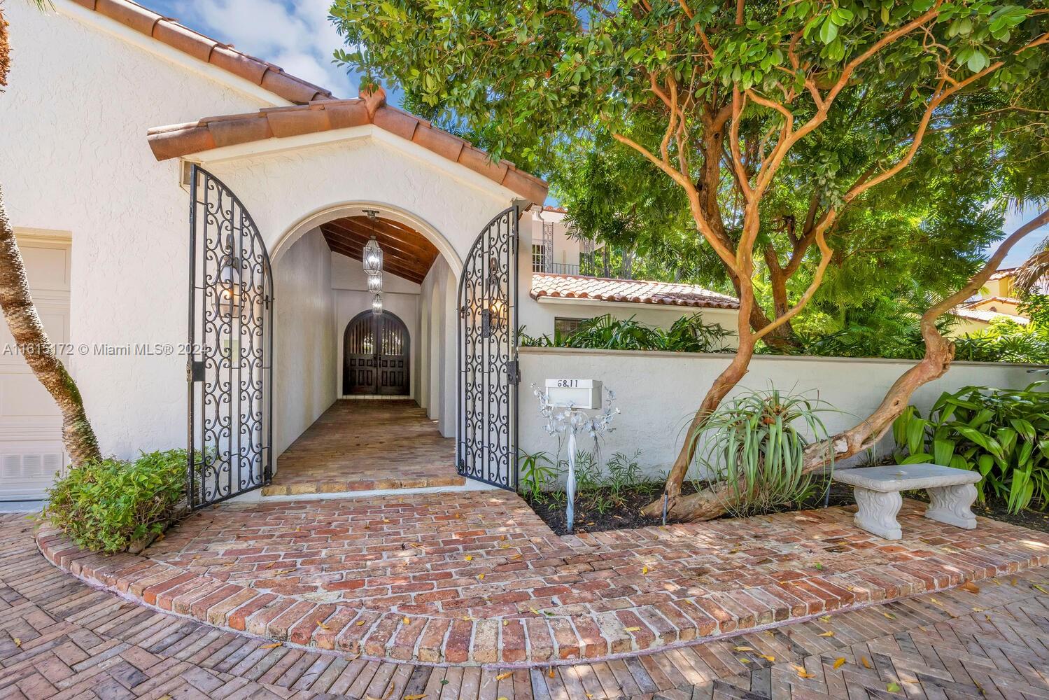 Live on Riviera Drive, one of South Coral Gables prettiest & most prestigious streets. Expansive, 3393 SFLA home w/ formal living, dining & family rooms + unique glass enclosed porch featuring vaulted wood-beamed ceilings. Additional home features include 2 car garage, Chicago brick circular driveway & patios, walled entry-courtyard, fireplace, ultra-private (entire 2nd level) main suite (w/walk-in closet, large bathroom + balcony). French doors open to captivating walled garden & oversized jacuzzi/spa. Unlimited potential to update & reconfigure the interior spaces (add BR’s/BA’s) with modern fixtures & finishes throughout. Incredible location close to world-class shopping & dining in Coral Gables and South Miami + minutes to the historic Grove village’s shops, cafes & bayfront parks.