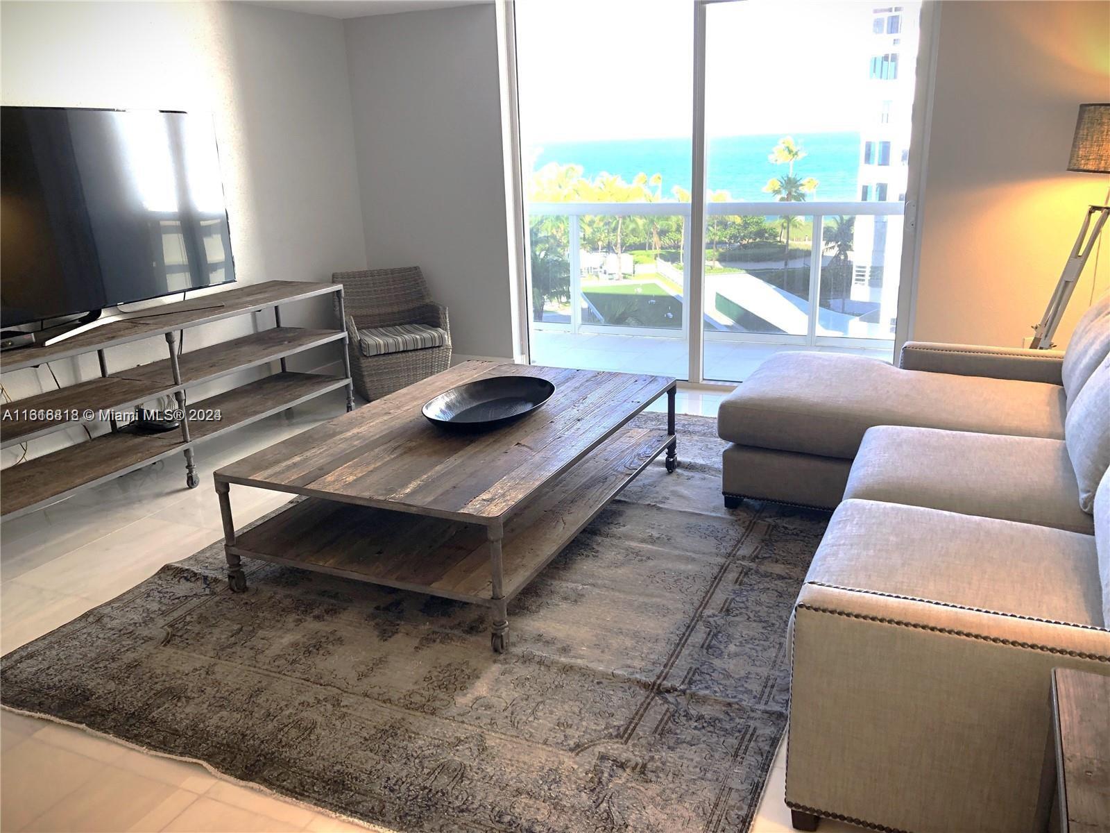 Stunning ocean views from this fully furnished 2/2 in Bal Harbour. Impeccable unit has been remodeled with marble floors throughout & high-end furniture. Washer/dryer inside unit. 1 assigned parking space. Great location, walking distance from Shops of Bal Harbour and restaurants. Amenities include top of the line gym, sauna, movie theater room, pool/spa, grocery market.