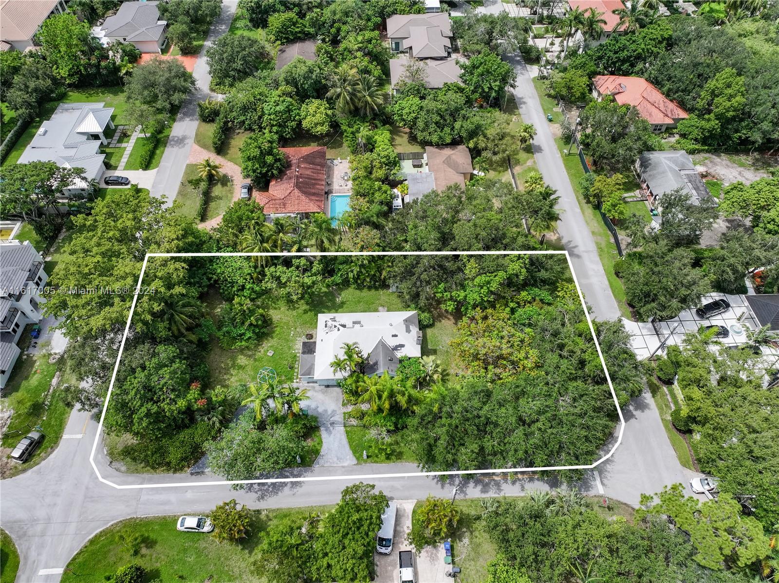 Rare opportunity to create your dream home on this lush 20,000 sq foot double corner lot in the heart of Glenvar Heights, one of Miami's most sought-after neighborhoods. This property comes with plans for a 7,914 sq ft residence, ensuring that every detail of luxury living has been considered. The total space, including outdoor areas, reaches an impressive 9,322 sq ft, providing an abundance of room for both indoor and outdoor living. Enjoy the convenience of being close to top-rated schools, shopping centers, fine dining, entertainment options and highways.