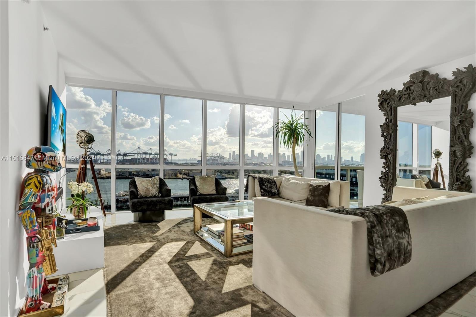 Experience the Epitome of luxury waterfront living at Murano Grande, nestled in the prestigious South of Fifth neighborhood. This Exquisite 2-bed/2.5 bath residence offers a dream condo experience for boating enthusiasts. Floor-to -ceiling window in every room showcase breathtaking water views, especially dazzling at night when Downtown Miami illuminates the skyline. The kitchen is a chef's delight with Subzero and Miele appliances seamlessly integrated European cabinetry. Residents indulge in a wealth of amenities, including a state-of-the-art fitness center, an on-site spa, a magnificent pool with restaurant service, 24-hour valet and concierge services, and a tennis court. Seize the opportunity to own this expansive condo in South Beach's most prestigious neighborhood!