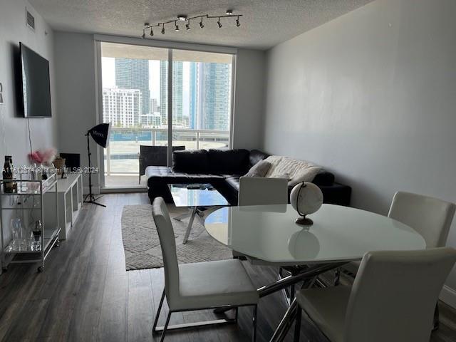 Bright furnished 1Bed/1 Bath condo with skyline views, balcony, gated parking located in the heart of Edgewater. This unit offers a sleek modern feel and charming character with a spacious balcony, kitchen featuring, granite countertops, bar seating and stainless, kitchen featuring white granite countertops, bar seating and stainless steel appliances. Washer & Dryer inside. Enjoy upscale amenities such as a pool, gym, and inviting common areas. Embrace walkability as you easily explore nightlife, restaurants, and shops in Wynnewood, Midtown, Design District and the best beaches. Don't miss this great opportunity! Available starting August 1, 2024.