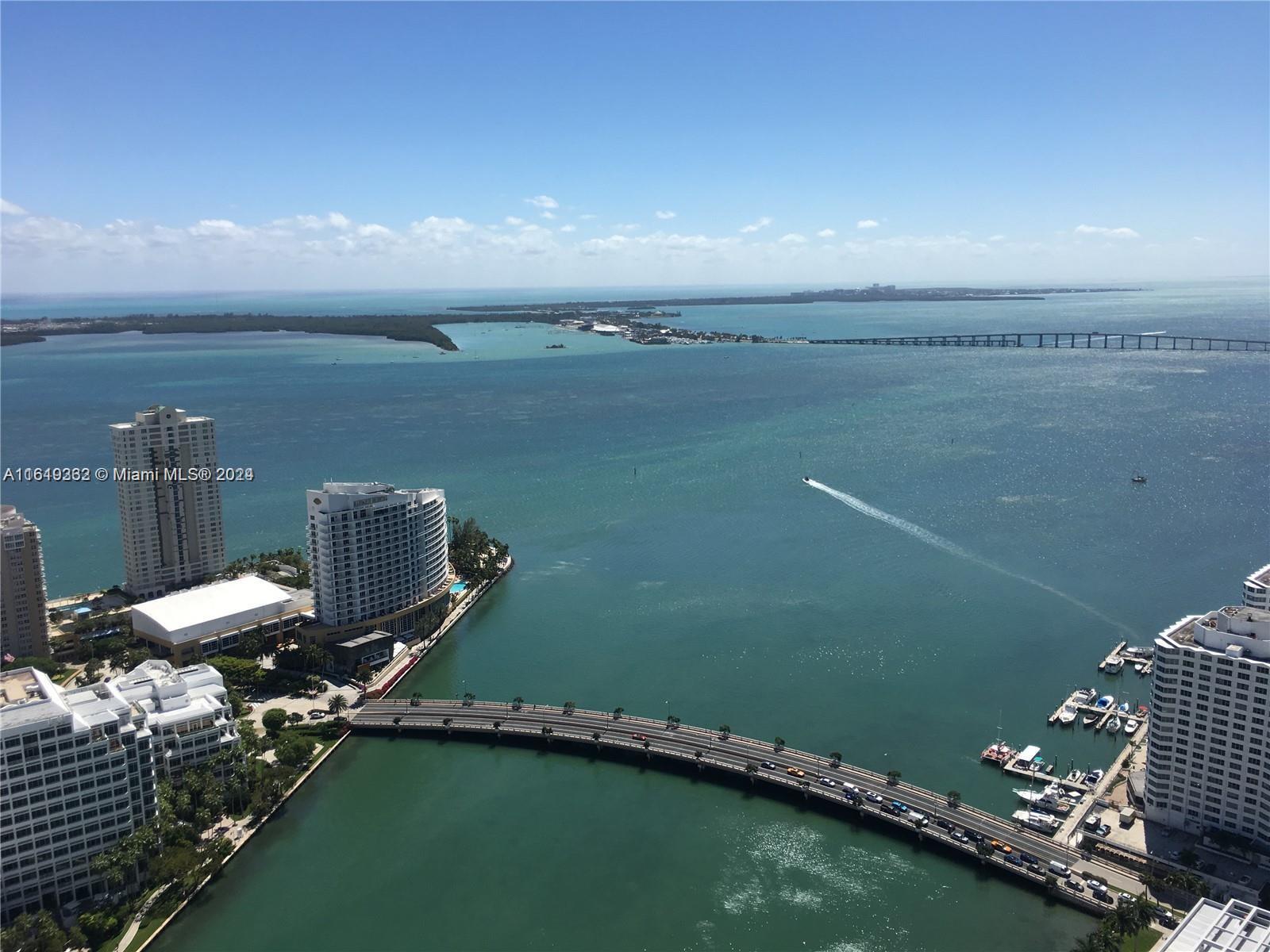 SPECTACULAR 1 BEDROOM, 1 BATH UNIT, LOCATED on the 50th FLOOR with a BREATHTAKING VIEW of BISCAYNE BAY, DOWNTOWN MIAMI, KEY BISCAYNE and SOUTH BEACH. ITALIAN PORCELAIN FLOORS in the INTIRE APARTMENT - ITALIAN CABINETS with ELEGANT STONE KITCHEN COUNTERTOPS and BACKSPLASH - 36" Sub-Zero REFRIGERATOR - 30" WOLF GLASS COOKTOP and OVEN. THIS ULTRA-CONTEMPORARY ARCHITECTURAL DESIGN WAS PERFORMED BY PHILIPPE STARK. COUNTS WITH 2 FULL SERVICE BAYSIDE RESTAURANTS AND THE MOST GLAMOROUS SPA, HEALTH CLUB and FITNESS CENTER- FULL TIME INTERACTIVE CONCIERGE - OLIMPIC POOL SURROUNDED BY TREES, LOUNGE CHAIRS - AMENITIES ONLY COMPARABLE TO THOSE LOCATED IN 5 STARS HOTELS