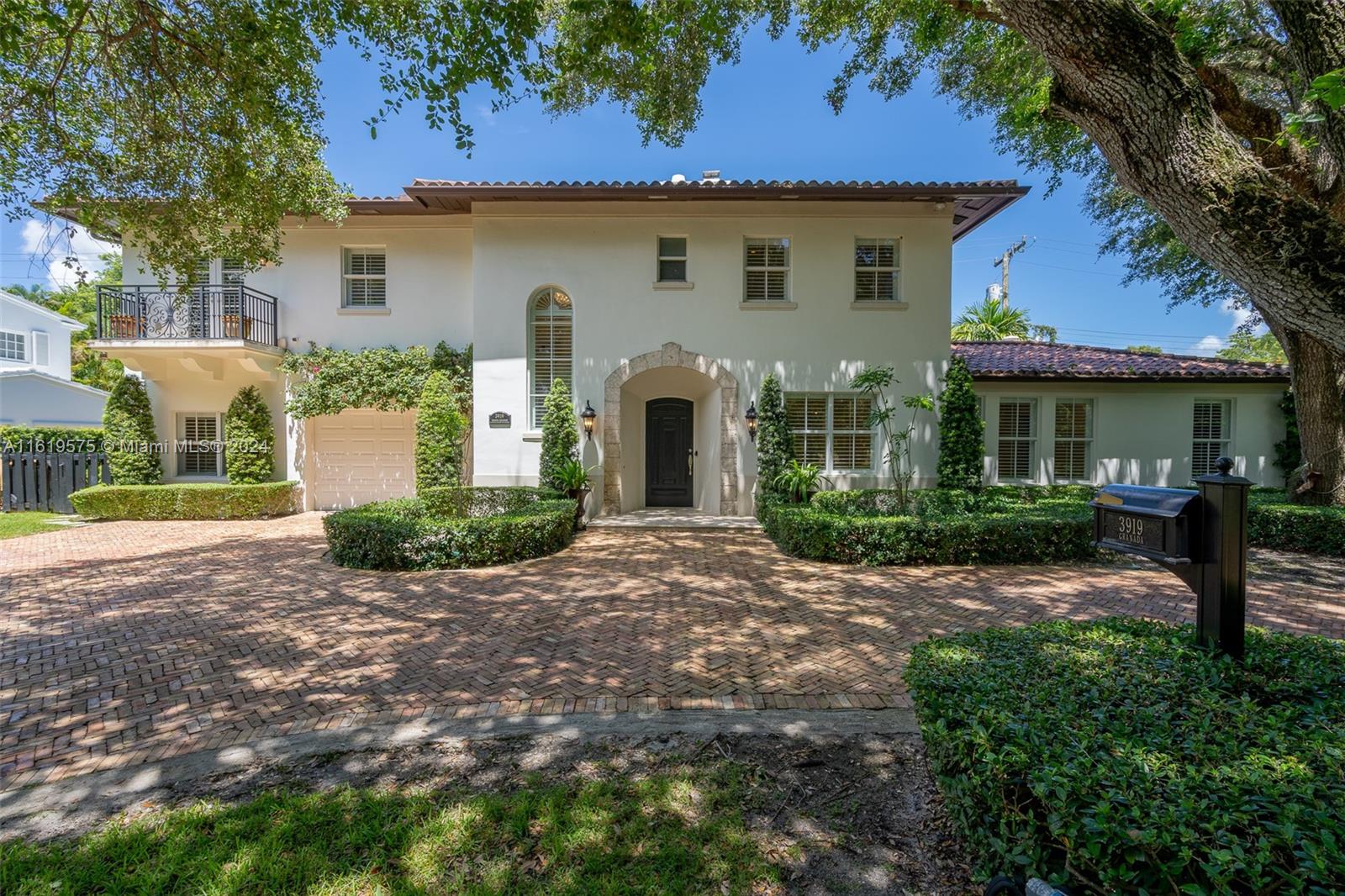 Perfectly situated on a majestic oak tree filled lot on one of Coral Gables most prestigious & desirable streets, this immaculate & completely renovated 5 bed/4.5 bath home has it all! On the 1st floor you will find richly appointed spaces that include a formal living room w/a chimney & marble floors, formal dining room, sun filled family room & a separate library w/beautiful built-in wood cabinetry. Enjoy entertaining in the bright professional-grade kitchen with lovely views to the outdoor perfectly manicured English topiary garden. Upstairs you will be welcomed to a spacious foyer area w/4 bedrooms & 3 baths. Relax in the screened outdoor backyard patio OR enjoy pleasant walks to the park across the street, Biltmore Hotel or the historic Venetian pool.