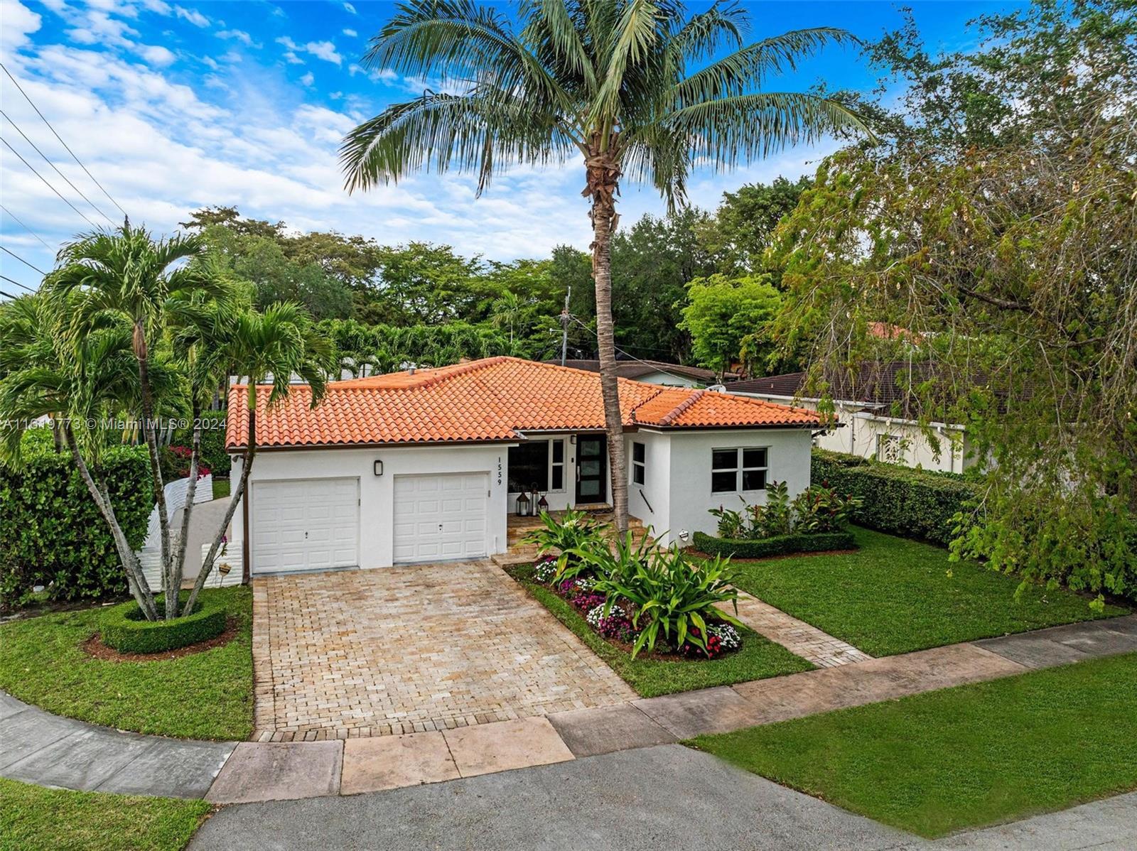 Turn key fully renovated 3/2 + two car garage Coral Gables home with amazing modern wood flooring throughout. The open concept design and flow-through space make it ideal for comfortable entertaining. Updates include impact windows and doors, beautiful picture window at the entrance. It also boasts a welcoming front porch, Spanish tile roof, tray ceilings, charming archways, remodeled bathrooms and kitchen. The kitchen features lovely subway tile, light wood cabinetry on granite countertops, and stainless steel appliances. The living and Florida rooms are spacious with large windows that allow ample natural light and garden views. Additionally, there is an huge 2-car garage and a nice sized backyard with Chicago Bricks, offering space to build a pool if desired.