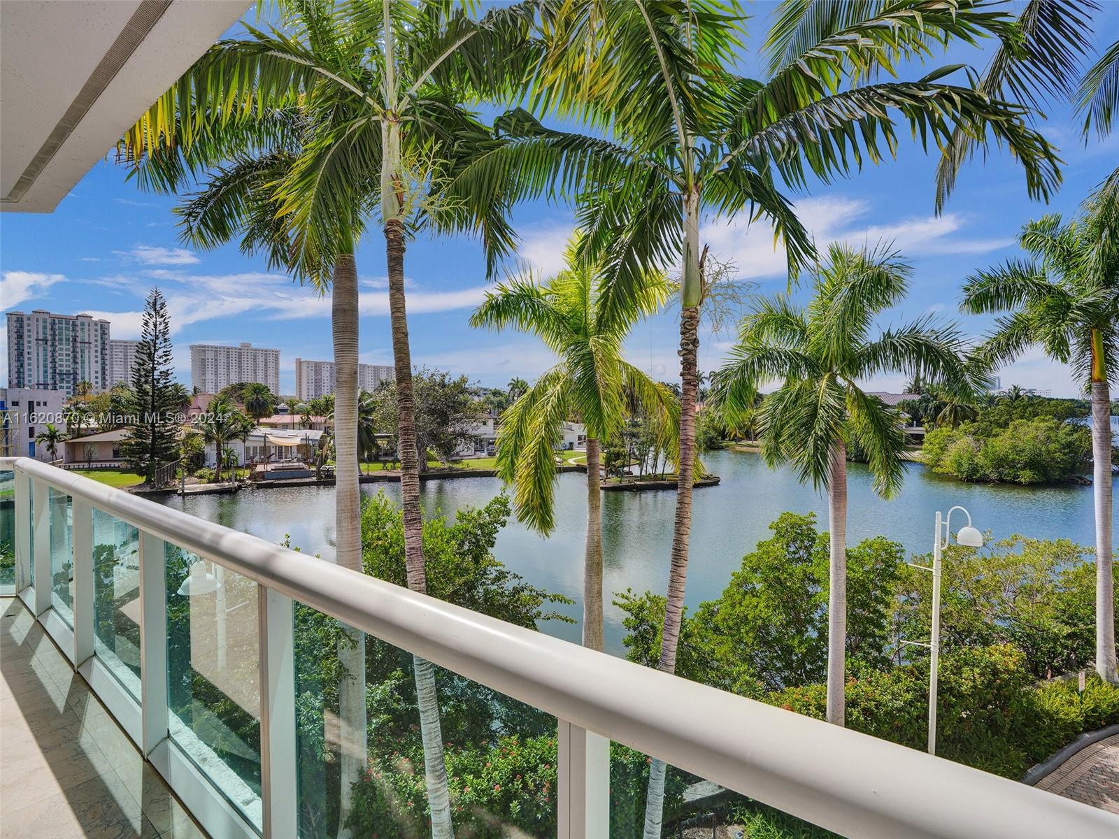 Price reduced for quick sale!!! Live in your own waterfront tri-level home in paradise! This corner home boasts spectacular views from 4 terraces. 4 bedrooms plus hobby room, and a maid room, 4.5 bathrooms, and a private garage! 3 stories, large spacious and high ceilings, 3,500 sqft. with top of the line amenities— beach club access, spa, gym, tennis courts and even boat dock availability! A true gem of a property. The perfect mix of a home and a condo, privacy without the maintenance; yet with all the amazing amenities of a luxurious building.