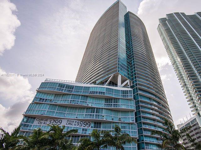 1BR/2BA with den that is practically a second bedroom. You simply can’t beat the combination of views and prime location of Marina Blue, in the heart of downtown and steps away from Kaseya Center, Maurice A. Ferre Park, and the burgeoning Miami Worldcenter. Beautifully remodeled unit with floor to ceiling windows throughout, highlighting the stunning panoramic views of the bay. Spacious open floorplan with abundant natural light and a large balcony; building has incredible resort style amenities including sunrise and sunset pools and jacuzzi, business and fitness centers, sand volleyball court, BBQ area, and more. 24-hour security, valet parking, storage room, and assigned covered parking space.