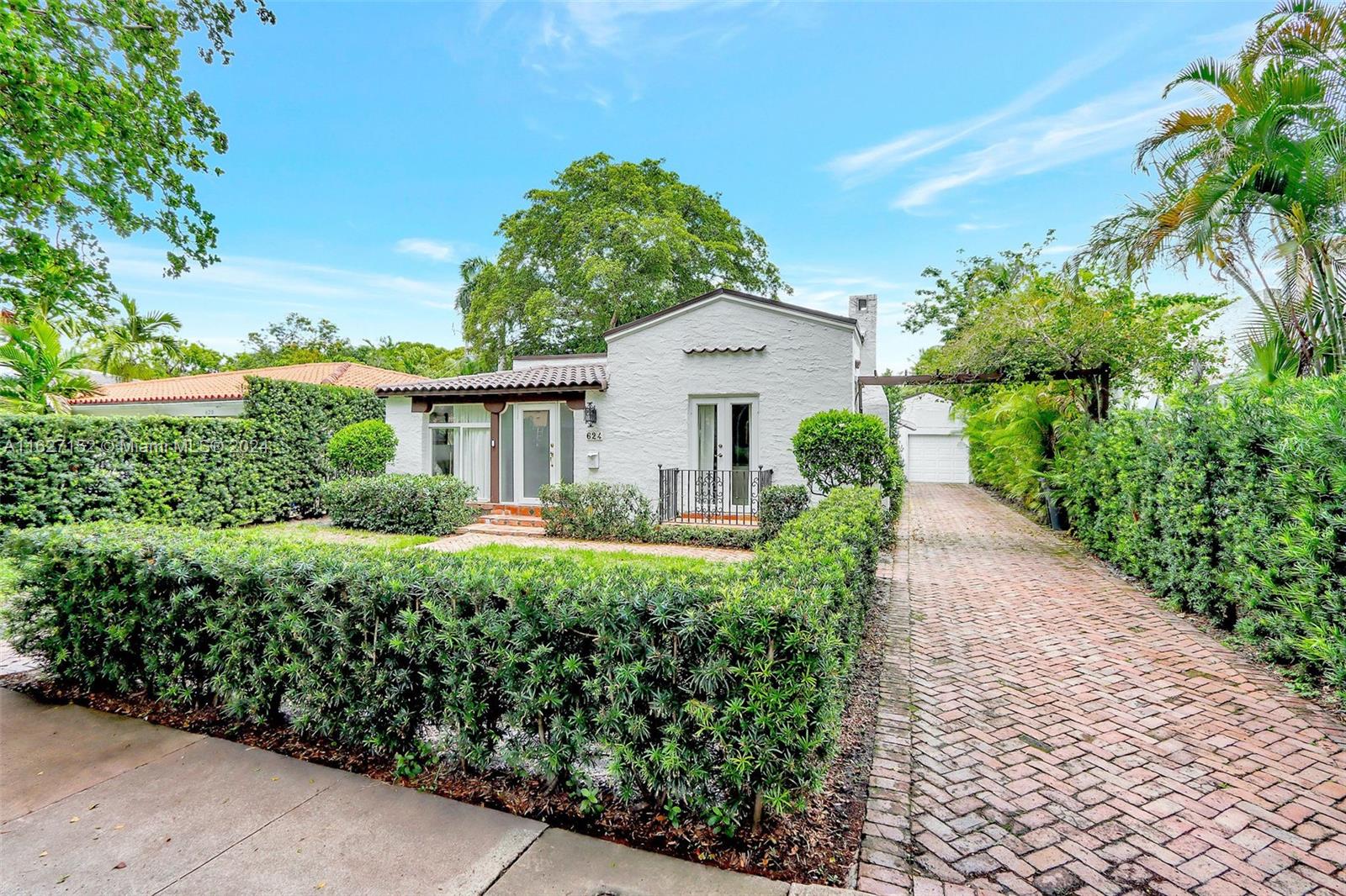 Step into the timeless elegance of this meticulously restored 3 bedroom, 2.5 bath, plus office, Old Spanish gem, nestled in the heart of Coral Gables. This special residence exudes an unparalleled charm that seamlessly blends vintage allure with modern comforts. As you enter, the warm embrace of original Dade County pine floors whisper stories of a bygone era. The main house features 2 bedrooms and 2 bathrooms and the guest house features 1 bedroom and a half bath. The property is near the esteemed Coral Gables Country Club and Granada Golf Course and within walking distance to Miracle Mile, where quaint shops, gourmet restaurants, vibrant art galleries, and cozy bookstores await your exploration.