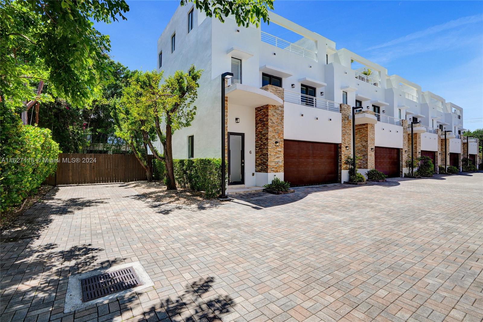 Discover contemporary elegance in this beautiful townhouse located in the heart of Coconut Grove. This exceptional residence offers 2,577 sqft of living space and an impressive 800 sqft rooftop terrace. Featuring 3 bedrooms, 2.5 baths, this home boasts 10.5-foot ceilings and a modern kitchen with a perfect island, Italian-style cabinetry, stainless steel appliances, and quartz countertops. Additional highlights include impact windows and doors, a well-equipped laundry room, and spacious walk-in closets in every room. The property also includes a two-car garage, and the expansive rooftop terrace is perfect for outdoor entertaining. The community is highly secure with a strong sense of neighborhood, with many primary residents being owners.