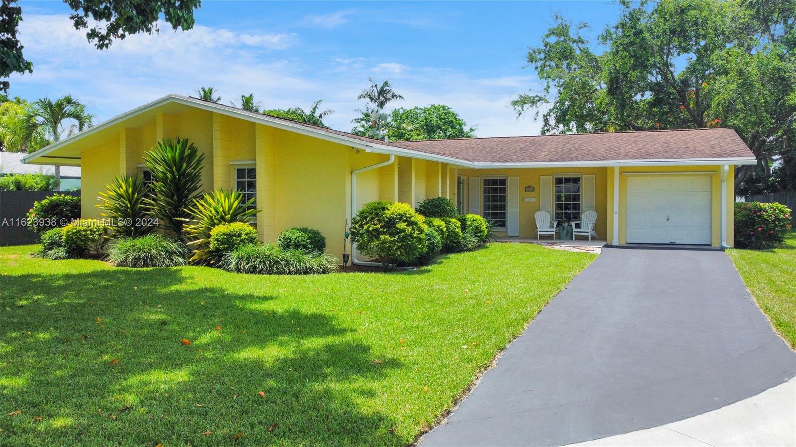 This stunning and beautifully decorated property is a charming gem nestled in a quiet cul-de-sac in the desirable neighborhood of Cutler Bay. This well-maintained home offers nearly 1,900 square feet of interior space, a galley kitchen with sleek stainless steel appliances, ceramic tile floors, and beautiful floor-to-ceiling plantation shutters in the living room, adding an elegant touch to the ambiance. Step outside to the covered patio, which provides ample space for both relaxing and dining while enjoying the serene surroundings. The expansive backyard offers plenty of room for a potential pool, while being enveloped by the tranquility of hundred-year-old trees. This property is a perfect blend of modern comforts and timeless charm, offering a peaceful retreat in a picturesque setting.
