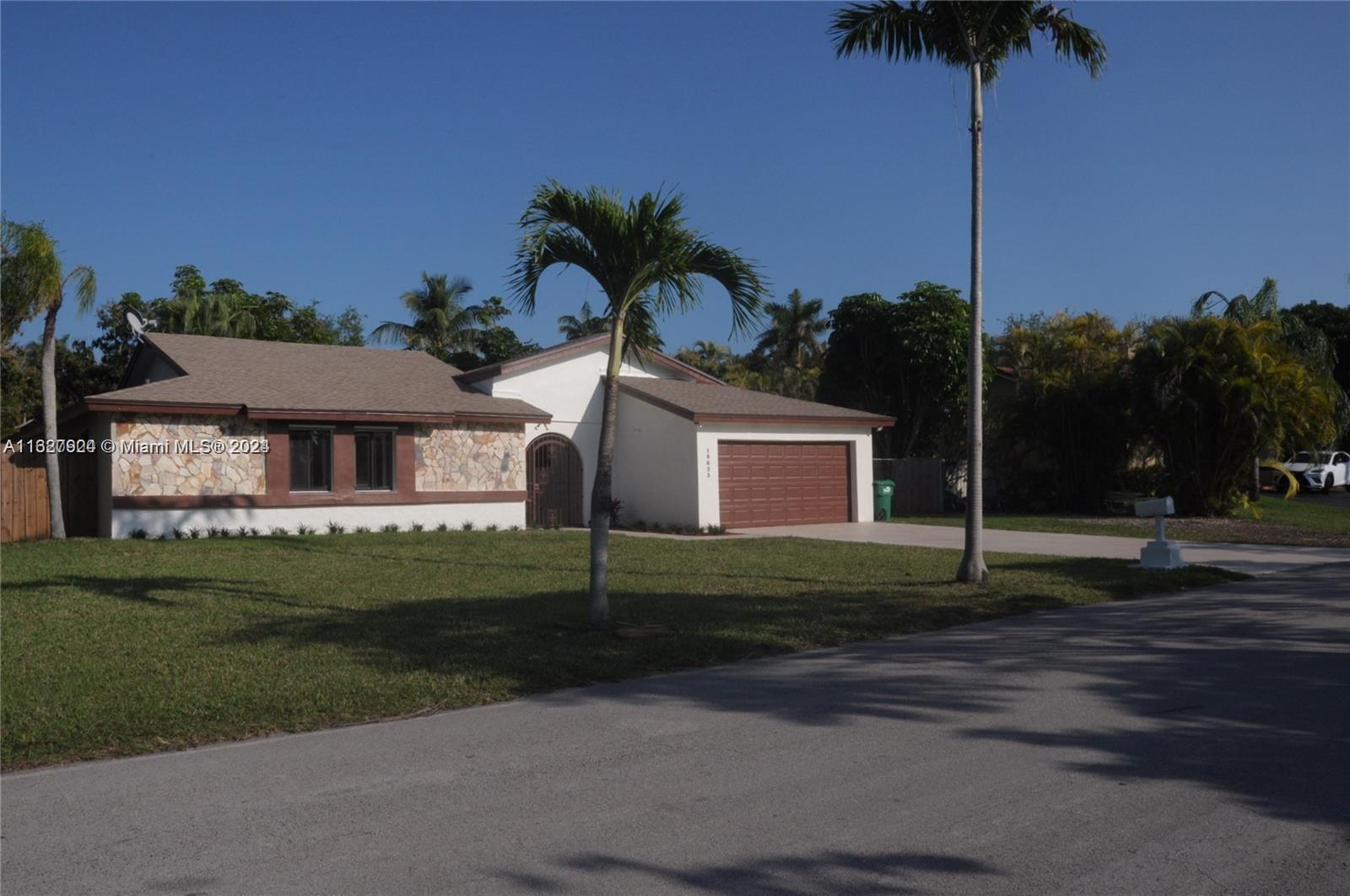 Fantastic and spacious 3 bedroom/2 bedroom home on huge 15,000 sq. lot in Cutler Bay, ready for move in! The interior layout provides spacious entering spaces, while also providing privacy for the bedrooms, remodeled bathrooms and plenty of sunlight. It boasts a fully remodeled stainless steel appliances, quartz countertops and plenty of cabinetry. The ample living room dining area with fireplace and sliding doors opening to the patio area serves as an introduction to the stunning backyard featuring a large pool and beautiful landscaping, perfect for entertaining. Don't forget the convenience of the two-car garage and ample driveway for a boat or RV. Very tranquil location, pets are welcomed.