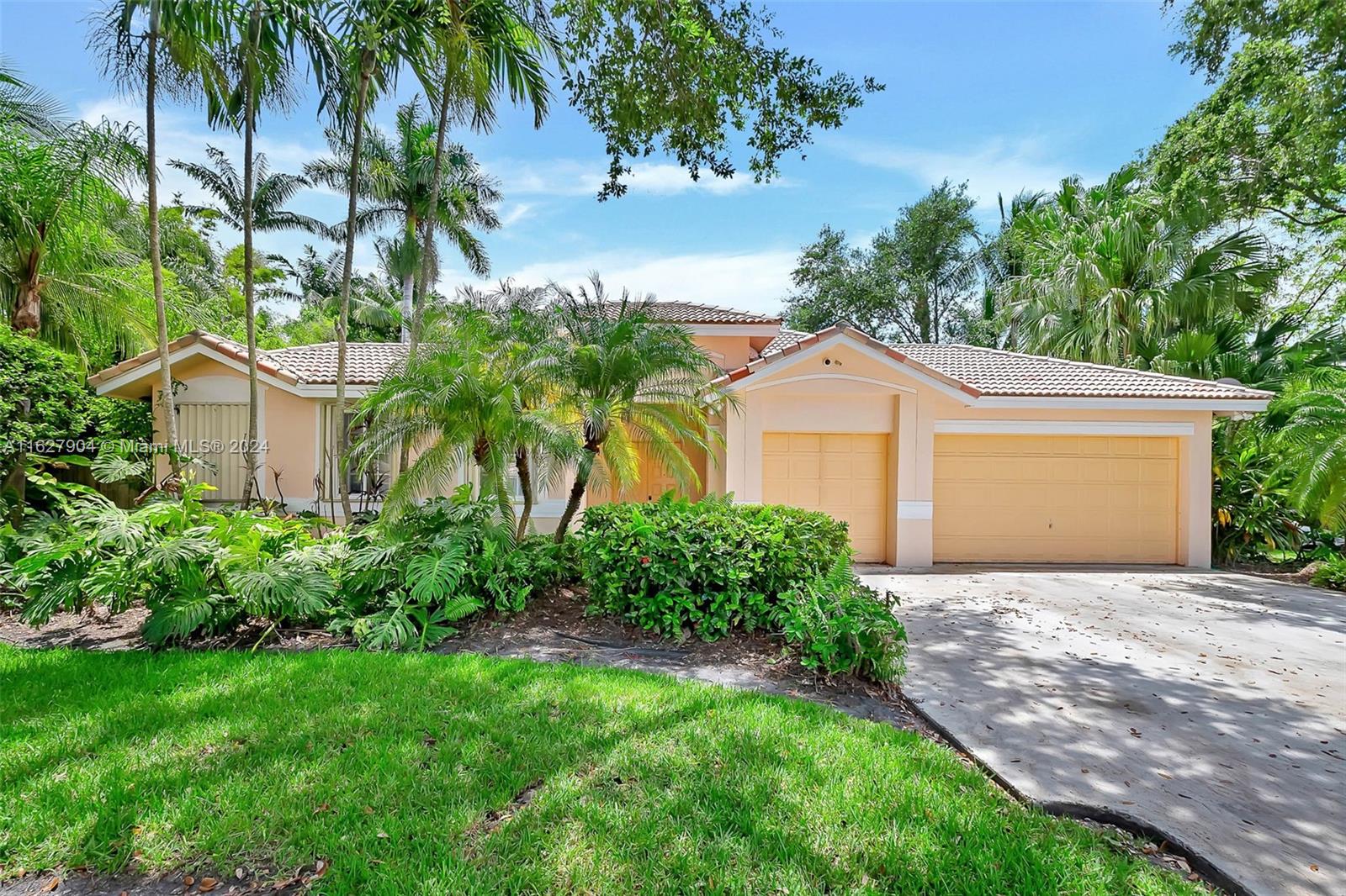 Embrace true South Florida living in this unique “patio home,” 4 bedroom, 3.5 bath plus office, situated on a fenced corner lot in Old Cutler Glen. Enter double doors directly into the tropical courtyard w/ pool and partially covered patio. Here you can access the separate en-suite guest quarters, perfect for in-laws or nanny. Main home has open living room w/ volume ceilings, newer vinyl flooring. Lovely kitchen w/ granite countertops, eat in snack bar, opens to dining room, with French doors leading out to the pool.  Split bedroom plan w/ “Jack n’ Jill” guest bedrooms. Private primary suite w/ large bath featuring claw foot tub, glass enclosed shower, dual sinks, water closet and double walk-in closets. Office off the living area. Indoor laundry room. Security cameras. 3 car garage.