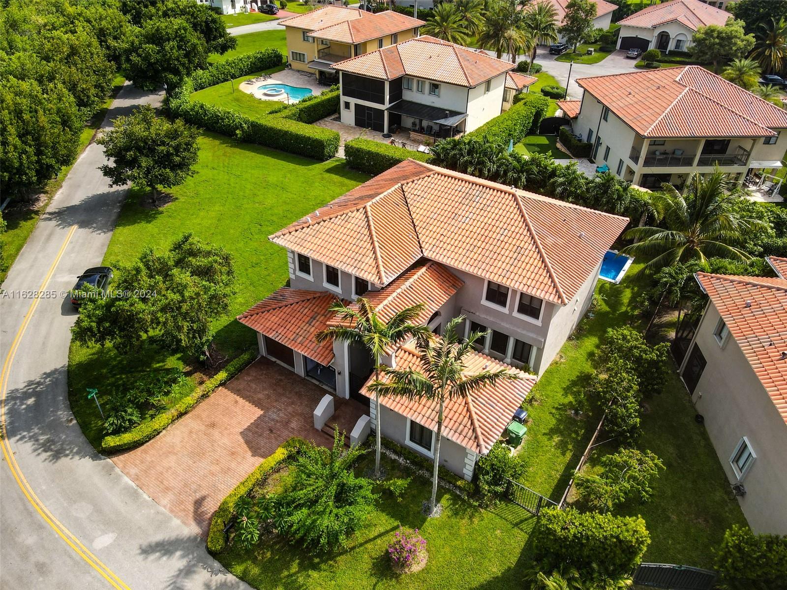 ***Discover luxury in this fully renovated 5-bed, 4-bath home in a coveted South Florida guard-gated community. Boasting a corner lot, this modern masterpiece includes a separate guest/in-law suite. Immerse yourself in elegance with a private pool and a lush backyard adorned with fruit trees. Enjoy privacy and exclusivity, along with community amenities like a pool, gym, and more. This exceptional residence is a perfect blend of comfort and sophistication, making it an ideal retreat.***