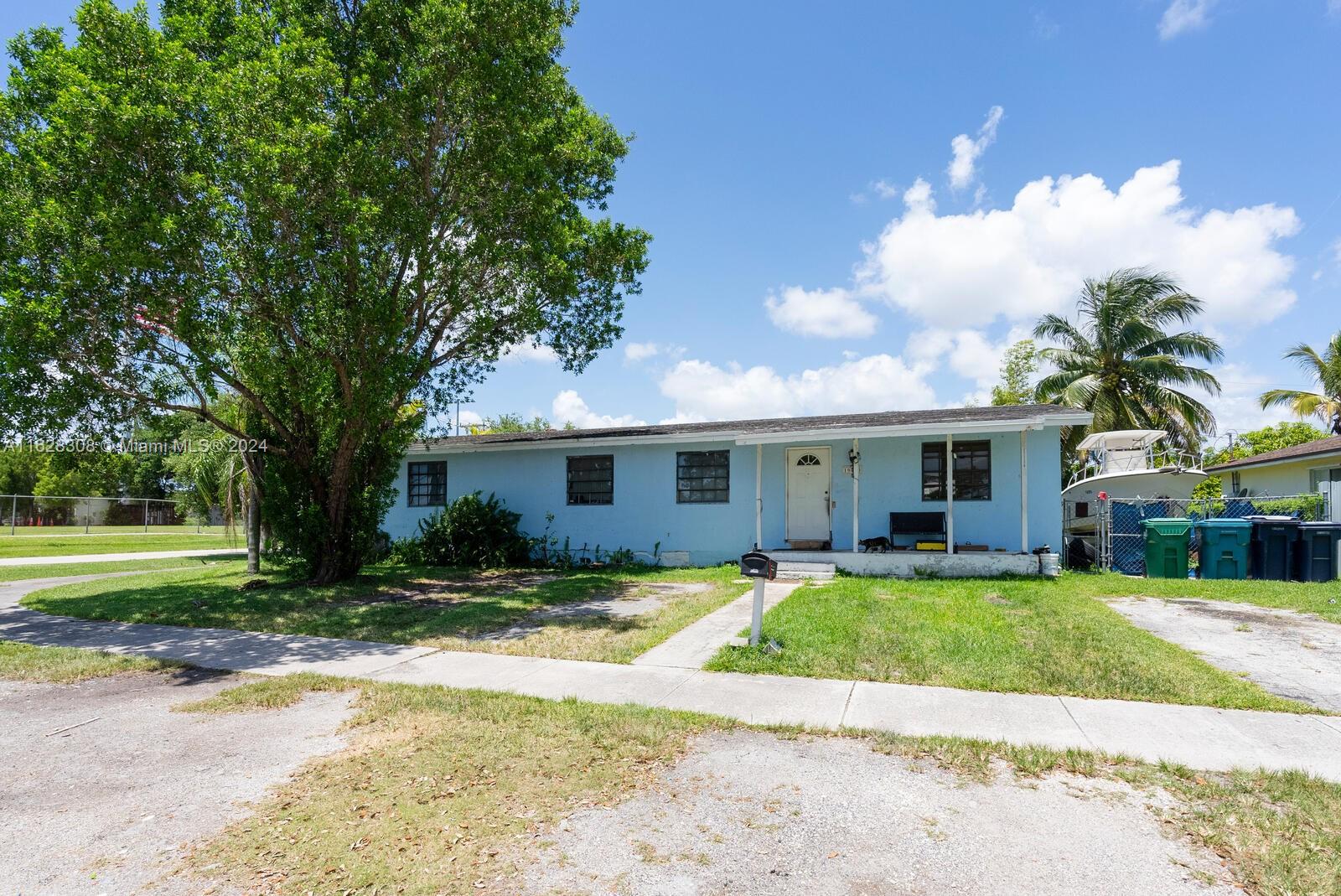 This 4-bedroom, 2-bathroom wood frame home in Cutler Bay is a renovator's dream, priced to sell and ready for a total makeover. Situated on a spacious corner lot, this property is just a block away from the vibrant Cutler Ridge Park and pool, where the community gathers for events like the chili cook-off, holiday celebrations, and food truck nights. With its prime location and great potential, this home offers a unique opportunity to create something special!  Don't miss your chance to transform this diamond in the rough into your dream home. Call to make your appointment today.