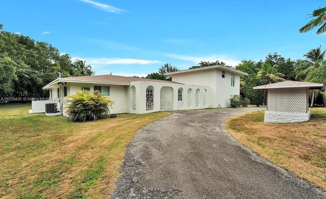 Step into comfort and privacy with this inviting split-level 2 floor spacious home in the heart of Pinecrest, close to schools, restaurants, shopping, and more! Featuring 4 bedrooms and 3 bathrooms, this home offers the perfect open floor plan that is perfect for entertaining. The impact doors & windows provide superior security & energy efficiency. Also featuring a 2-car garage w/ a circular driveway within a gated 1.42 acre lot. Move in cost: 1st month + 2 month security deposit. Tenant screening a MUST. Easy to show. Text/email listing agent for showing instructions.