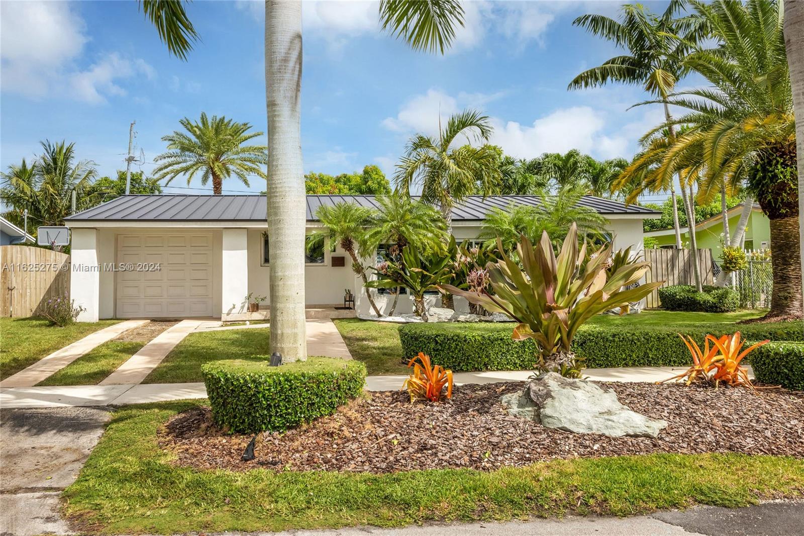 Step right in and feel at home in this renovated and well-maintained property in the heart of Cutler Bay. Charming curb appeal welcomes you with lush landscaping, metal roof, and a covered front porch entry. This light, bright, and airy home features an open floor plan, plantation shutters, impact windows/doors, and indoor laundry room plus workspace. The amenities continue into the generous backyard with parking for a boat and/or golf cart, storage shed, fire pit, hot tub, and room for pool. Enjoy an idyllic neighborhood feel with proximity to the bay, shopping, parks, and schools. You won’t want to miss this one!