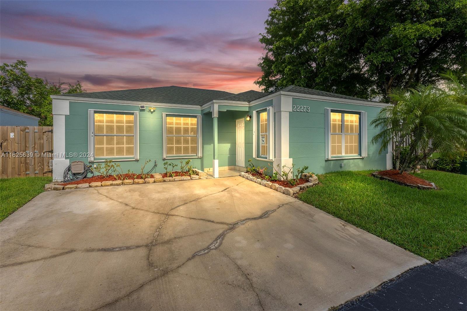 Welcome to your future home in the coveted Catalina community of Cutler Bay! This charming, one-story corner home features 3 bedrooms, 2 bathrooms, and a spacious lot. The roof was replaced in 2018, ensuring peace of mind for years to come. Enjoy the convenience of accordion shutters on all windows, and the elegance of porcelain tile flooring. The modern kitchen boasts marble countertops and stainless steel appliances. Residents enjoy a low HOA fee of $455/quarterly, granting access to amenities such as tennis courts, a pool, and a playground. Strategically located just 7 minutes from the Turnpike US-1, you'll have easy access to nearby restaurants and supermarkets. Nestled in a private cul-de-sac, this home offers both privacy and convenience.