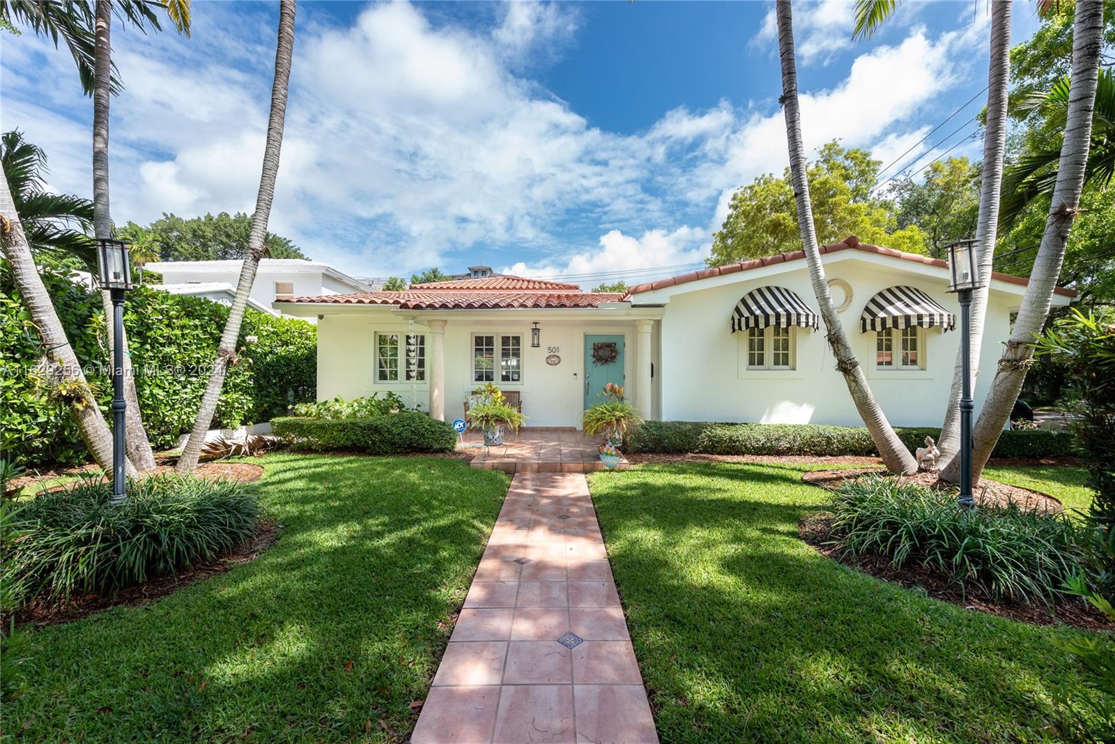 This lovely home is within walking distance of downtown Coral Gables, so this is Urban living at its best. The house is conveniently located on the corner of Sevilla & Hernando 3 bedrooms, and 2 baths with an updated kitchen with a center island and a large pantry. When you enter the home you are greeted by a lovely living room and open dining room area, next to the large family room with soaring 15' ceilings with incredible natural light. French doors open to a large sparkling pool and large covered patio, creating the ultimate indoor/ outdoor living space for entertaining friends and family. Oversized garage, impact windows. Adjusted sq. ft. is 2,338. The house is in the freebee zone and close to the farmer's market, Biltmore Hotel, and Coral Gables Youth Center.