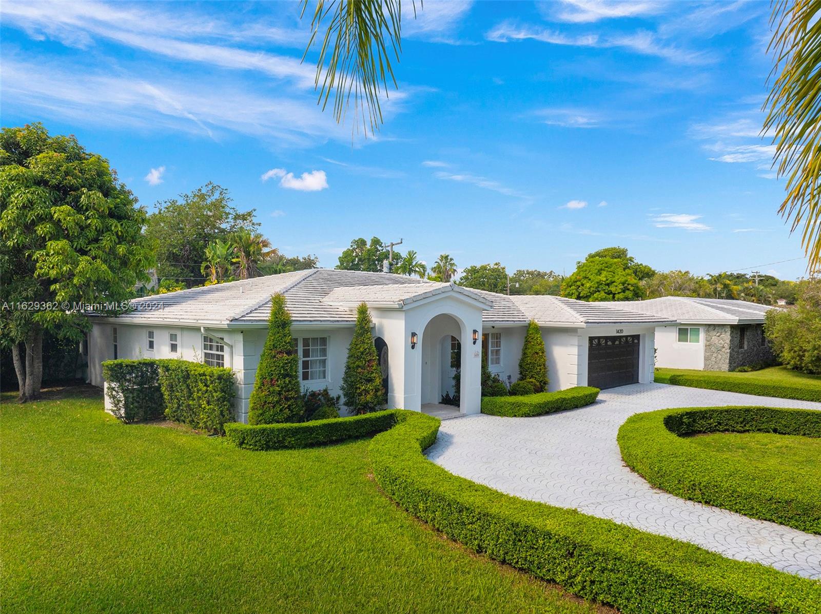 Nestled on a 10,600 sf lot, just a few feet away from the Gables by the Sea park and the renowned Gulliver Academy, this exquisite, turnkey 4-bed 4-bath home offers luxury and convenience in one perfect package.

As you enter this 3,329 sf split-floorplan home, you'll notice the beautiful double archway between the living room and the open concept kitchen/dining area. The kitchen, bathrooms, lighting, porcelain floors, impact windows and doors, plumbing, and a double HVAC system were all updated in 2021.

On one side of the house, you will find two bedrooms, each with full bathrooms (one is accessible from the living room). On the other side is an office overlooking the pool, and two larger bedrooms with their own full bathrooms and sitting rooms. The roof is less than 5 years old.