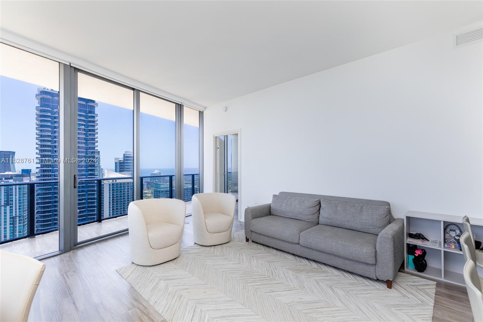 Experience the Miami skyline and bay from this luxurious 3/3 residence at SLS LUX. Enjoy exclusive privileges, designer interiors, rooftop pool terraces, celebrity chef restaurants, and top-notch amenities including a spa, sky lounge, and fitness center.