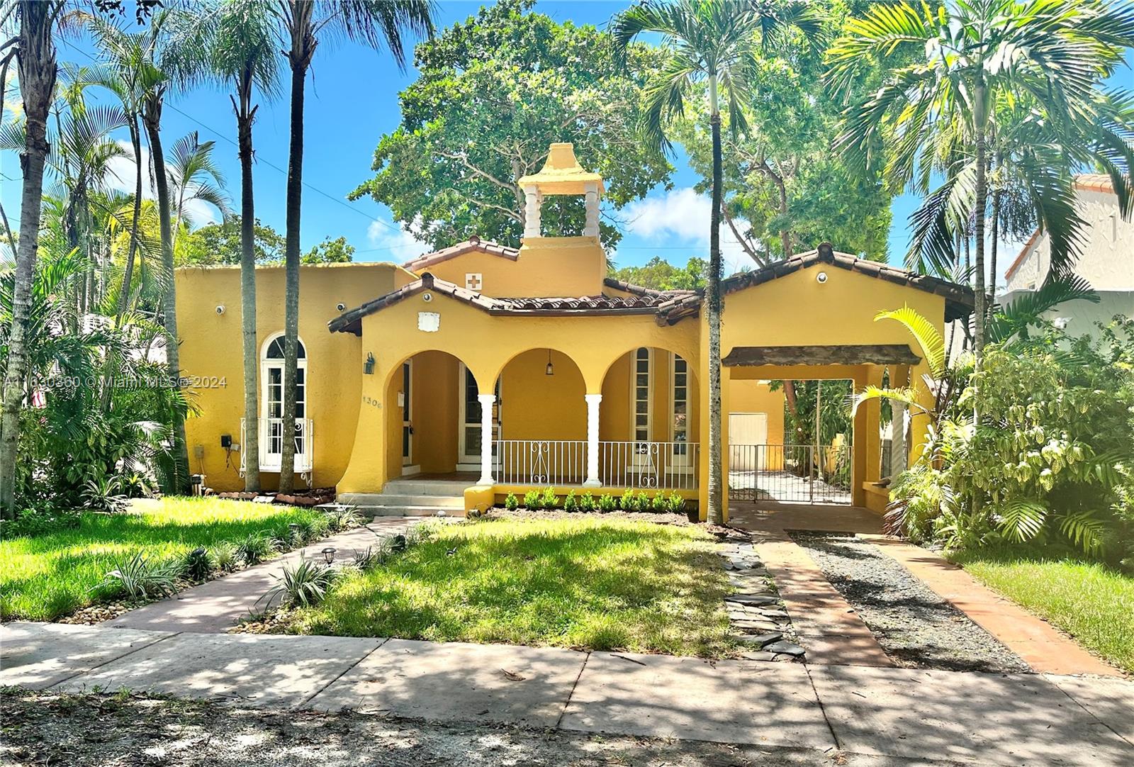 2/1 + Sunroom in Main House & 1/1 Cottage. Beautiful Old Spanish 1924, George Merrick home exceptionally restored. U shaped with all rooms French doors opening to center Romantic Courtyard.  One of its kind and rarely on the market.