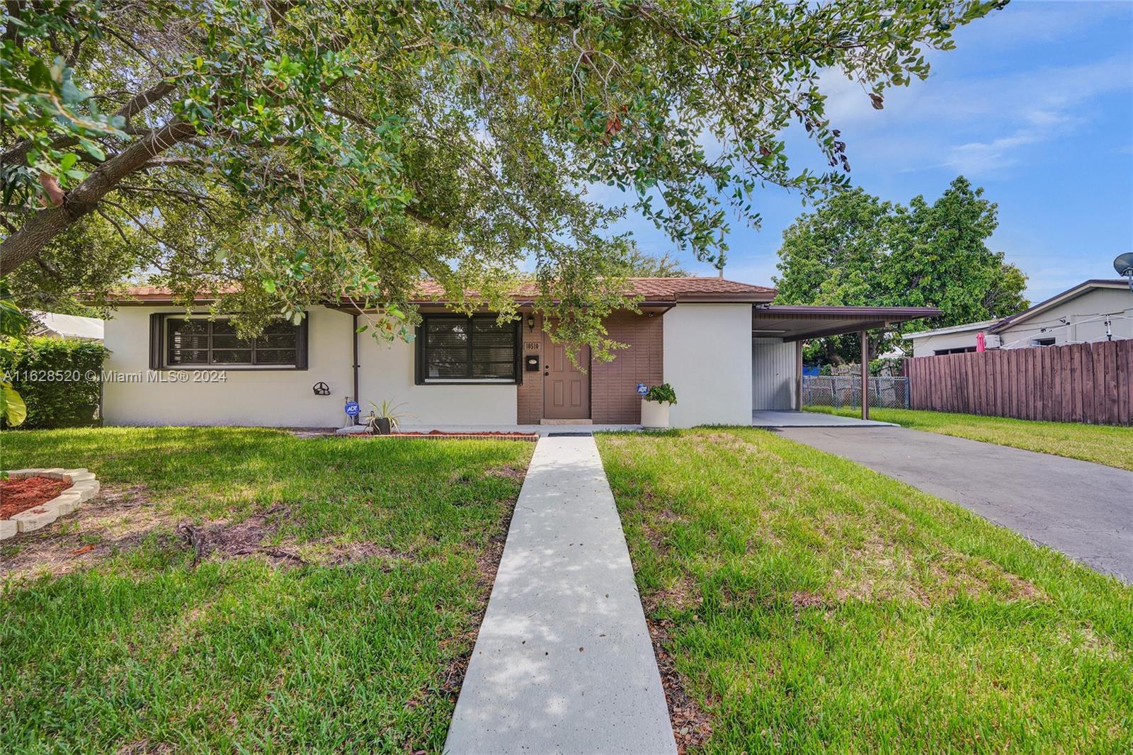 Welcome to this Charming 2 bed 1 bath home in Cutler Bay, don’t let the bedroom count deter you from this great house. Very well maintained and updated. Modern PVC plumbing, New Kitchen with granite tops and all new SS appliances, Very nice metal roof installed in 2022 and accordion shutters all the way around, newer AC system, workshop and a very large shed with lots of storage.  Nice covered carport and large yard with plenty of privacy and lots of room for your boat or RV. Backyard paradise includes your Zen pond, palm and oak trees. Absolutely ready to move in and enjoy..