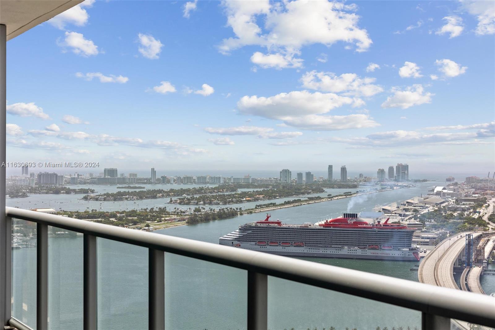 Enjoy breathtaking views of Biscayne Bay and downtown Miami's skyline from the 40th floor of this beautiful 1/1 plus half bath at Marina Blue. Wood floors throughout. Large walk in closet. 1 storage locker included in rent. Bldg features: sunrise & sunset pools, hot tub & plunge pool, 24-hour security & concierge, valet, business center, gym, yoga/aerobics room, BBQ grills & outdoor dining area, club room, 5-hole putting green & Wi-Fi Internet access throughout the common areas. Walking distance to the AAArena, the Shops at Bayside, Arsht Center, PAMM, Frost Museum, tons of restaurants & metro mover conveniently located behind the building. One time $150 cleaning fee to be paid upfront.