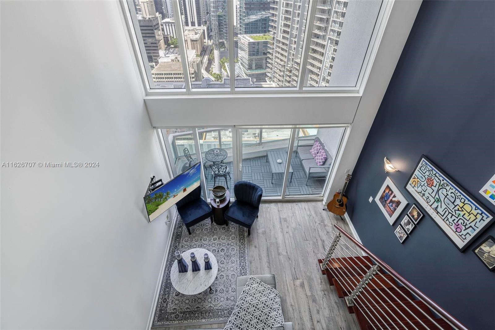 Experience the best of Brickell living in this stunning 2-story loft-style condo with unobstructed views. This 1-bedroom, 1.5-bathroom residence offers breathtaking panoramic city & Miami River views. The expansive floor-to-ceiling impact glass windows fill the open floor plan with natural light, creating a bright & inviting atmosphere. The modern kitchen boasts stainless steel appliances installed in 2022.

Step outside and find yourself within walking distance of top-rated restaurants, Brickell City Center, Mary Brickell Village, and vibrant entertainment venues. 

Enjoy full-service amenities, including two pools with sunrise and sunset views, a 3-story fitness center, a business center, a jacuzzi, a sauna/steam room, club rooms, and a 24-hour concierge.