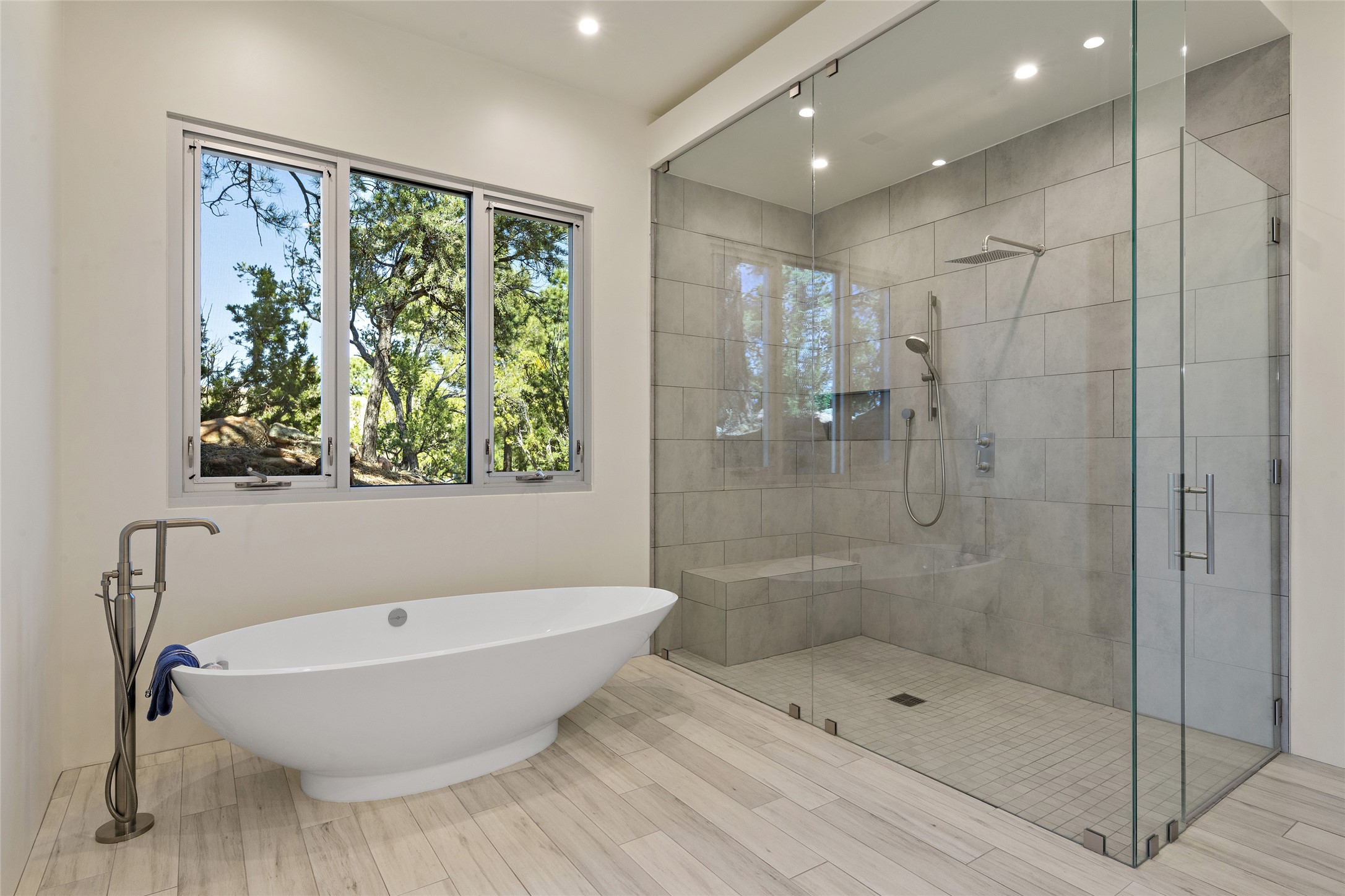 Primary Bathroom's Large Shower and Soaking Tub