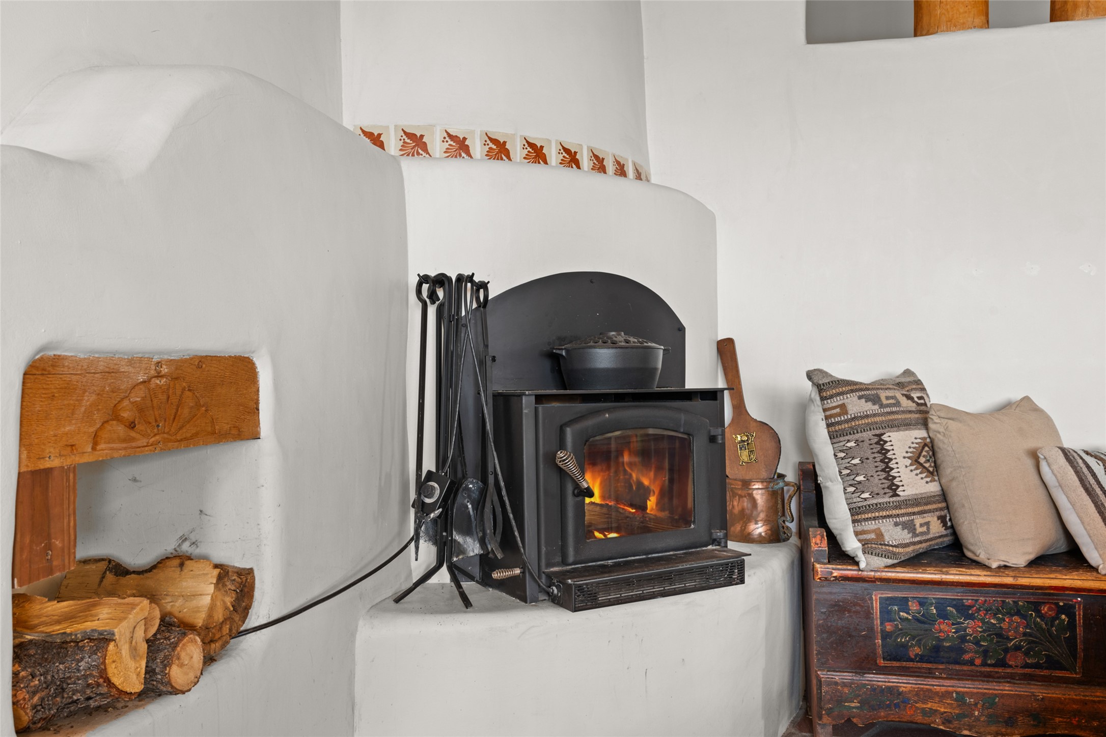 Kiva fireplace with insert