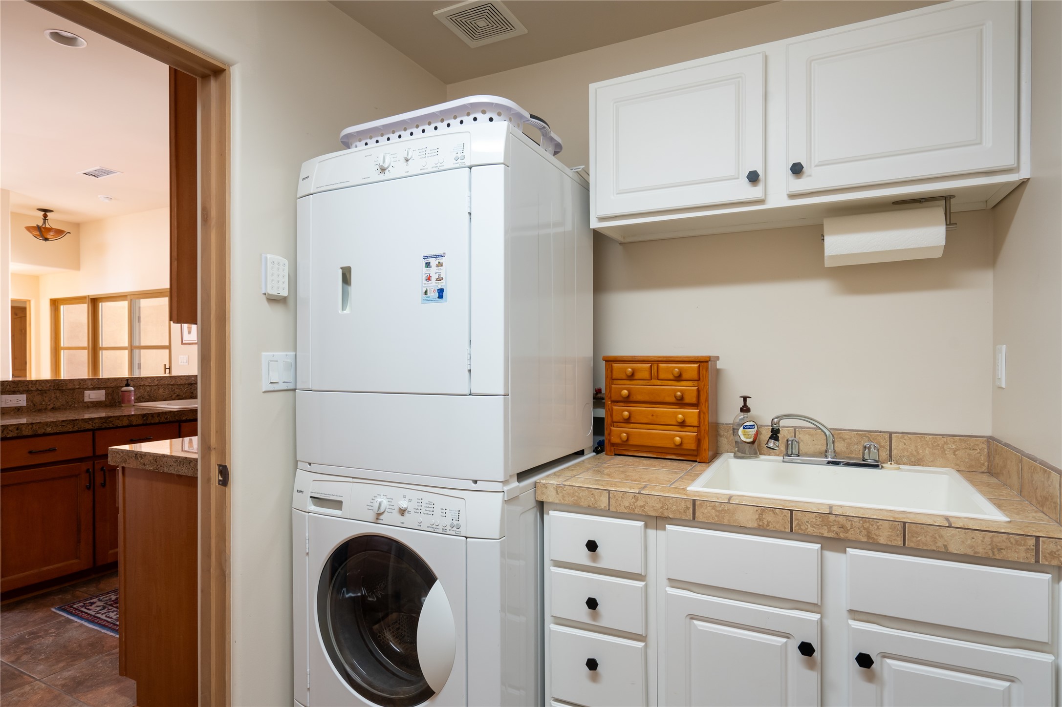 Laundry Room located between kitchen and garage