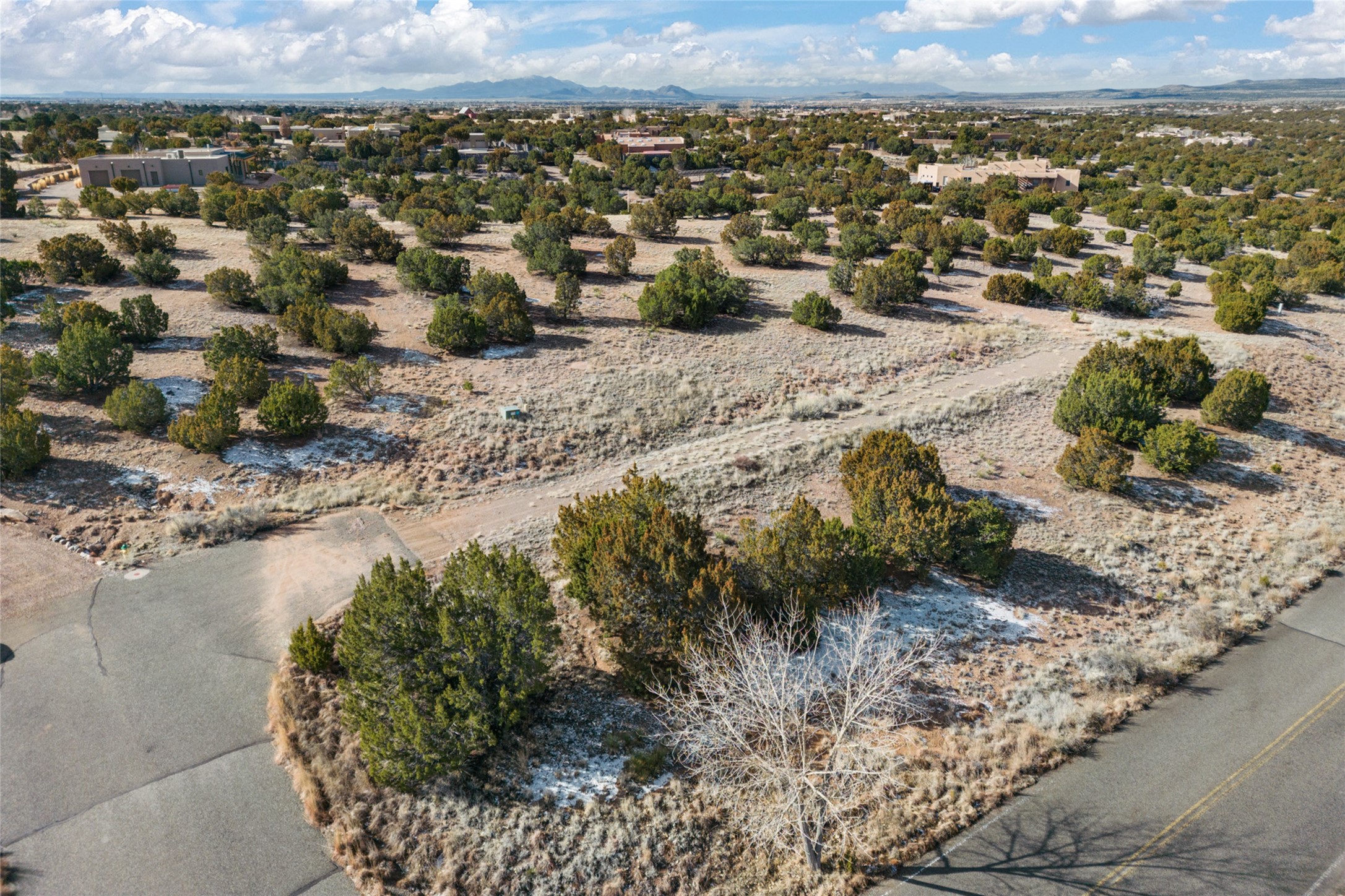The driveway from the Cul-de-sac for Lot 21; 1 La Vida Court with views to the Sandia Mountain