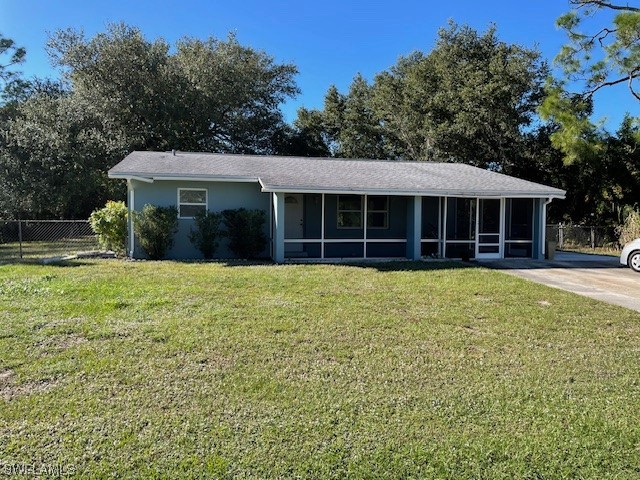 Wonderful starter or retirement home on a fenced in .50 acre in a developing Lehigh neighborhood. New A/C in 2023, roof in 2017, hot water tank 2018, and new air ducts. Updated home yet you can put your own personal touch to it. Carport is screened in and needs painting on floor. New water softener and filter. Beautiful yard with room for pool. Quiet street with access to Joel Blvd. State Rd 80, Lee Blvd., shopping and public transportation nearby.