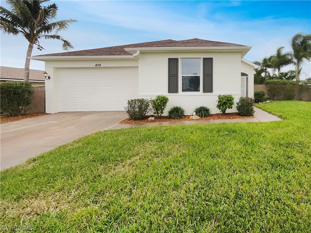 409 NW 20th Place, Cape Coral, FL 33993
