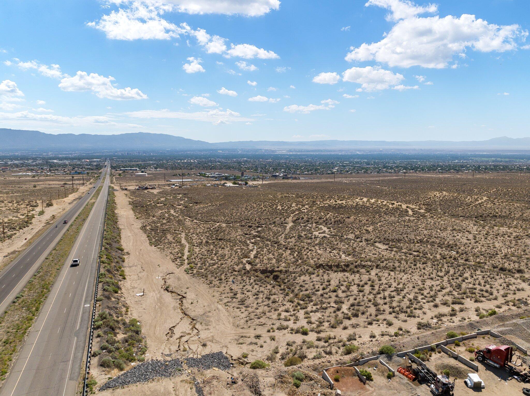 A rare opportunity to own a piece of property in Albuquerque's West Central sector development plan, seven minutes away from Amazon's fulfillment center. Wedge between I-40 and the Iconic route 66, this property borders Central! This lot is one of the few zoned SD - WC - CLI, which incorporates existing CLI zoning with additional users, such as aspects of C - 2, hotels, motels, resorts, drive in restaurants, automotive sales, and much more!