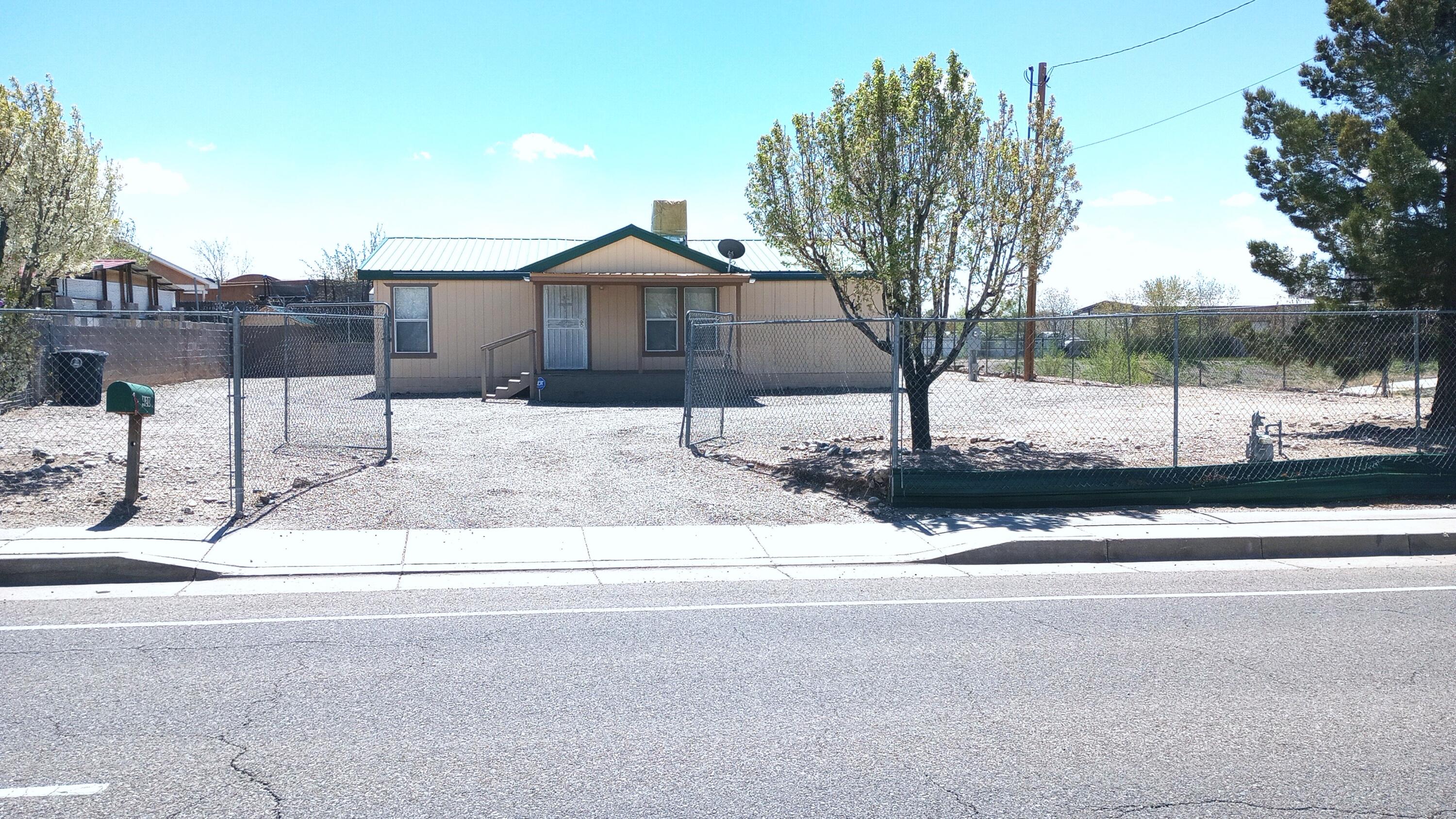 This move in ready well cared for home is situated on a huge fenced in lot and features vaulted ceilings, a spacious eat in kitchen, two full baths and a master walk in closet. All appliances plus the shed in the back convey. Centrally located with quick access to Downtown & UNM.