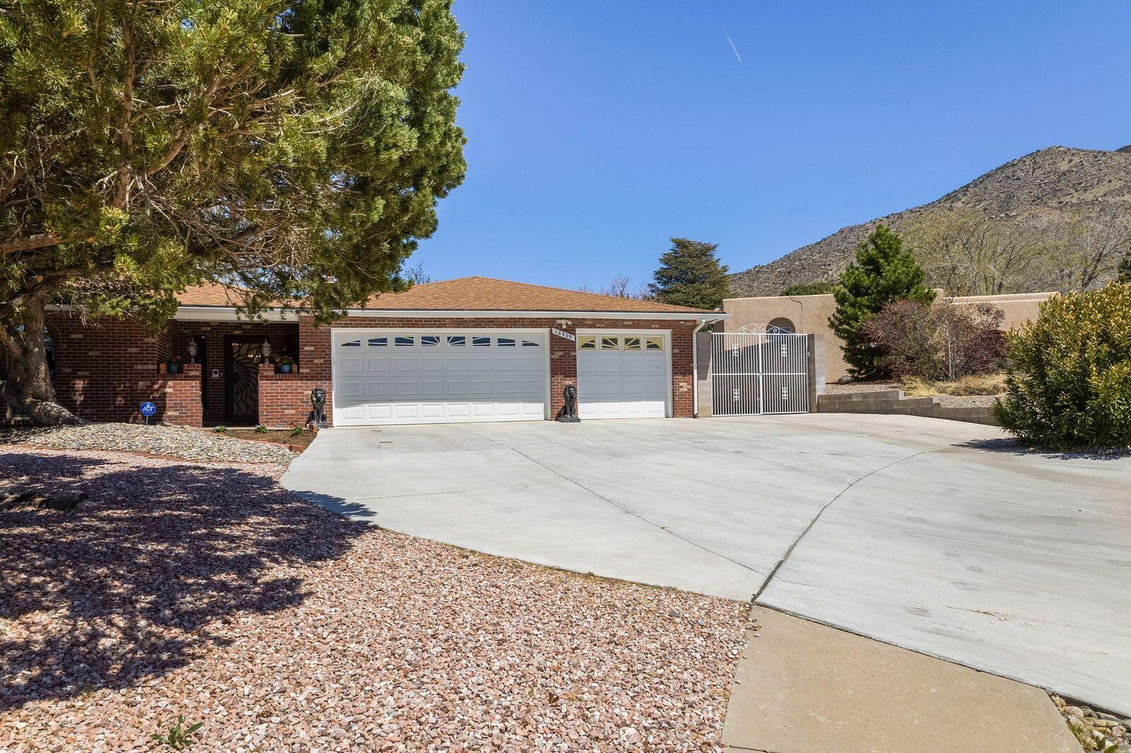 Nestle in a serene cul-de-sac, this dream home offers luxury and comfort. Beautiful well cared home, new flooring, paint, large windows, skylights, granite counter tops large pantry. Cozy family room with fire place and  bar. Backyard with large covered extended patio, mature trees provides a tranquil space for outdoor dining and relaxation. Side yard with dog house and dog run. Seller owns security system and water softener.