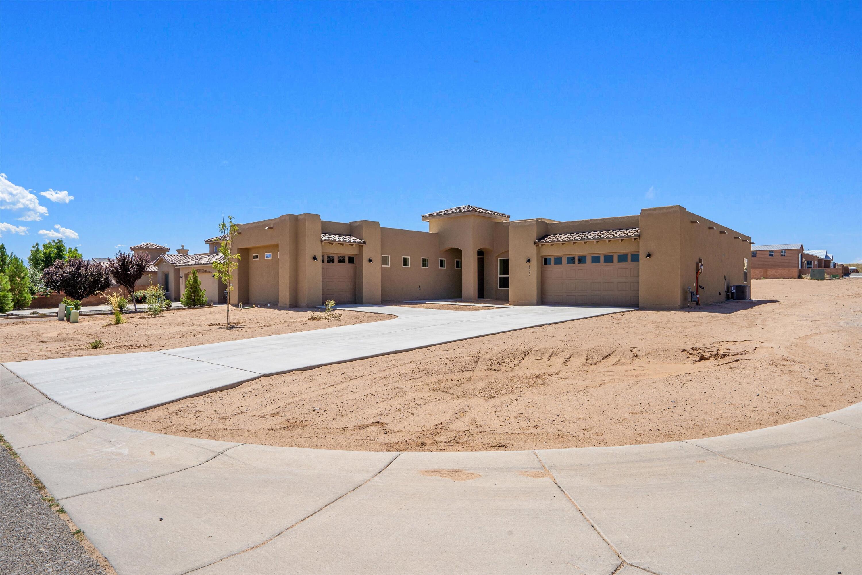 Newly completed new construction home on a half acre corner lot, with paved roads, and all city utilities.  It features high ceilings, open space, and plenty of separation between bedrooms. A definite must see!  The home will come with a kitchen appliance package: dishwasher, refrigerator, microwave, and gas range stove.  The builder is also contributing up to 2% of the buyer's loan amount towards closing costs, if the buyer uses the builder's preferred lender.*** Block wall is getting installed ***